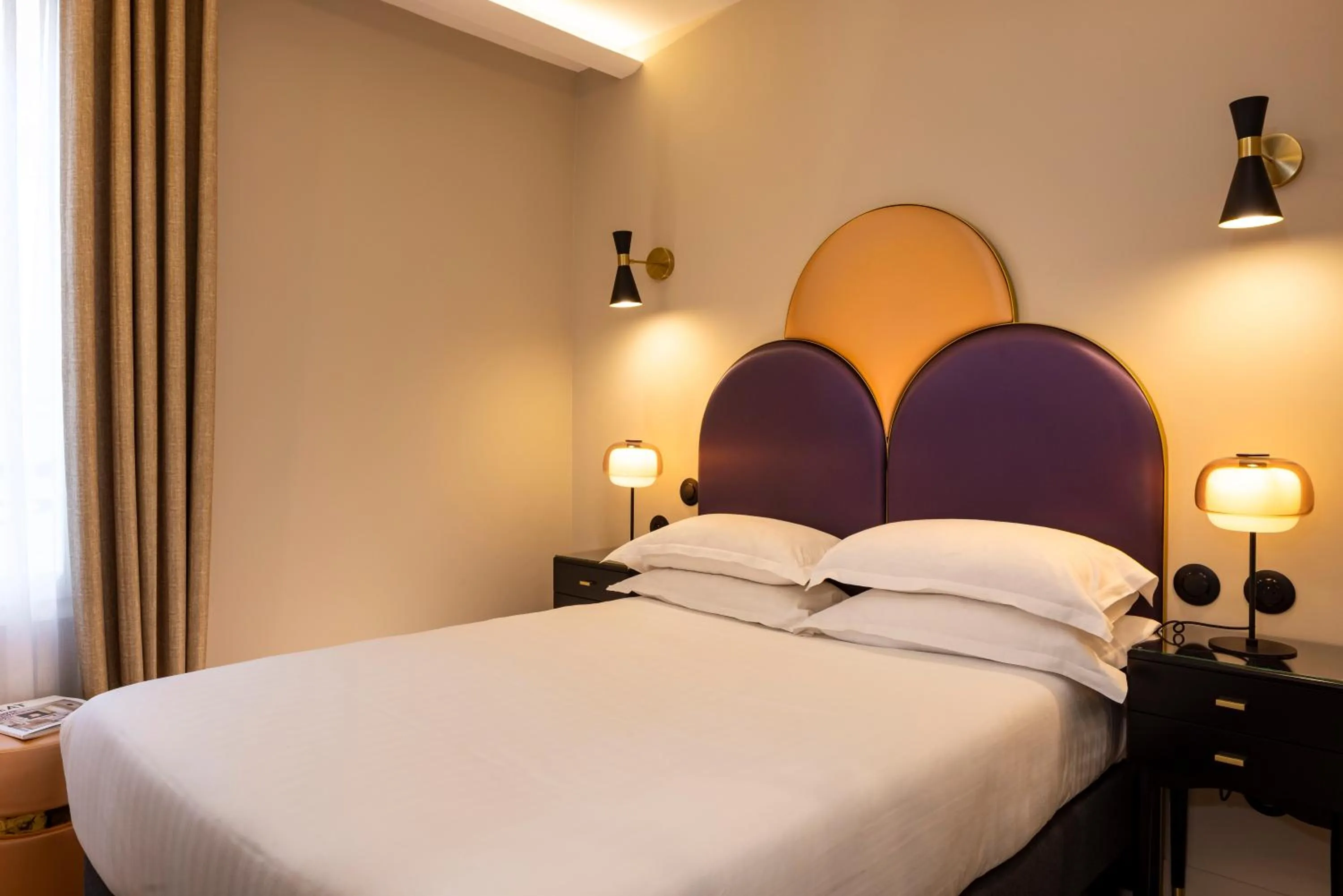 Bed in Hôtel Mondial