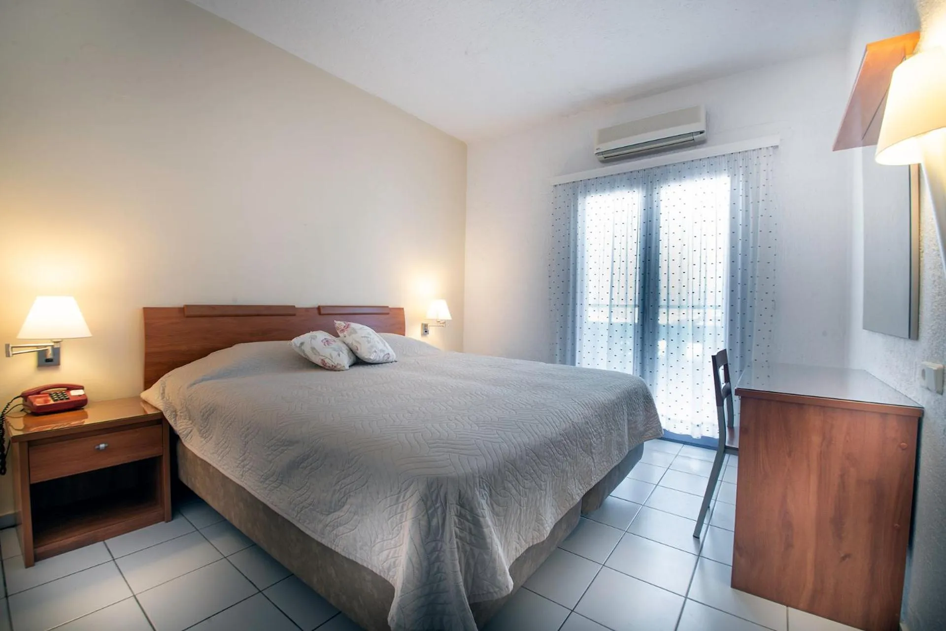 Bed in Palatia Village Hotel Apartments