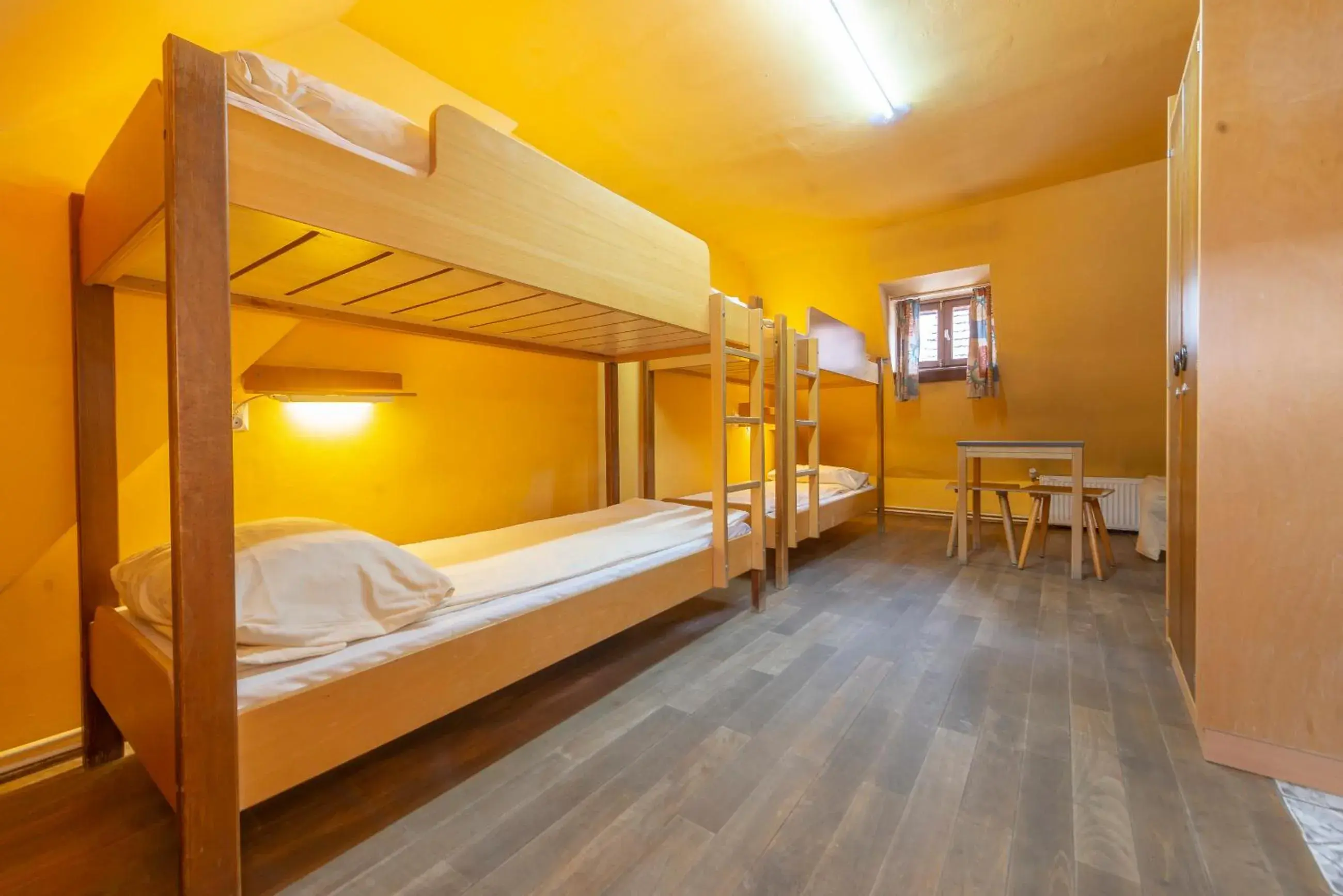 Bed in 4-Bed Dormitory Room with Shared Bathroom in Burg Hostel Sighisoara Bed in 4-Bed Dormitory Room with Shared Bathroom in Burg Hostel Sighisoara