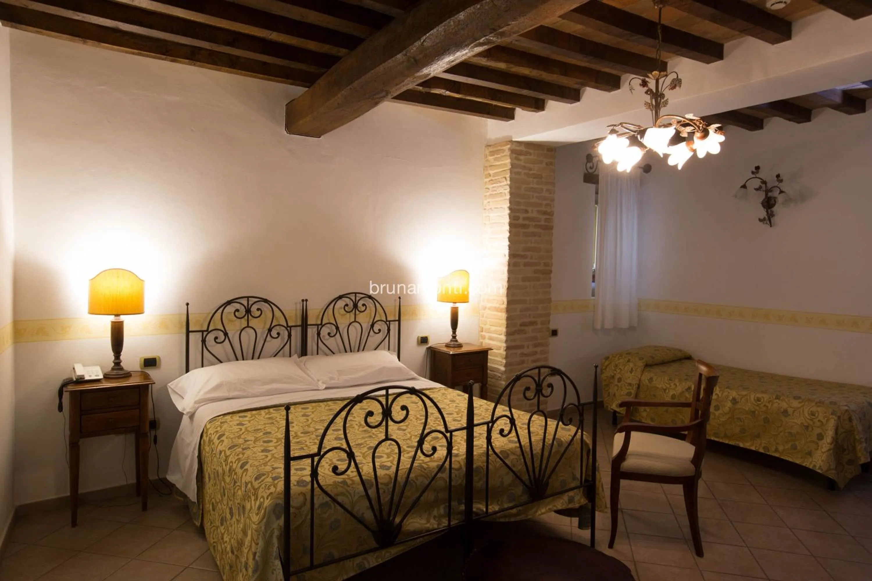 Bed in Hotel Palazzo Brunamonti