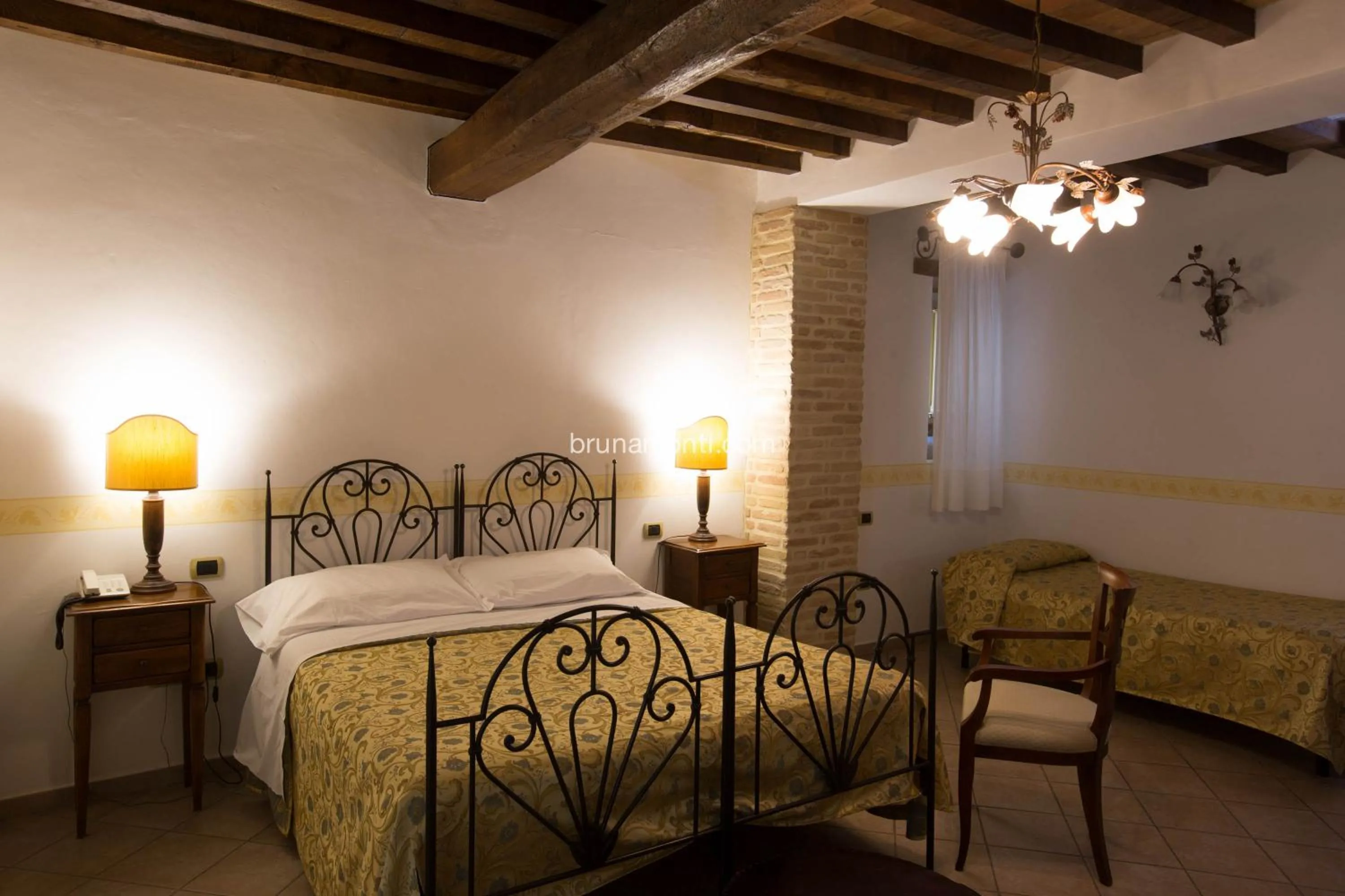 Bed in Hotel Palazzo Brunamonti