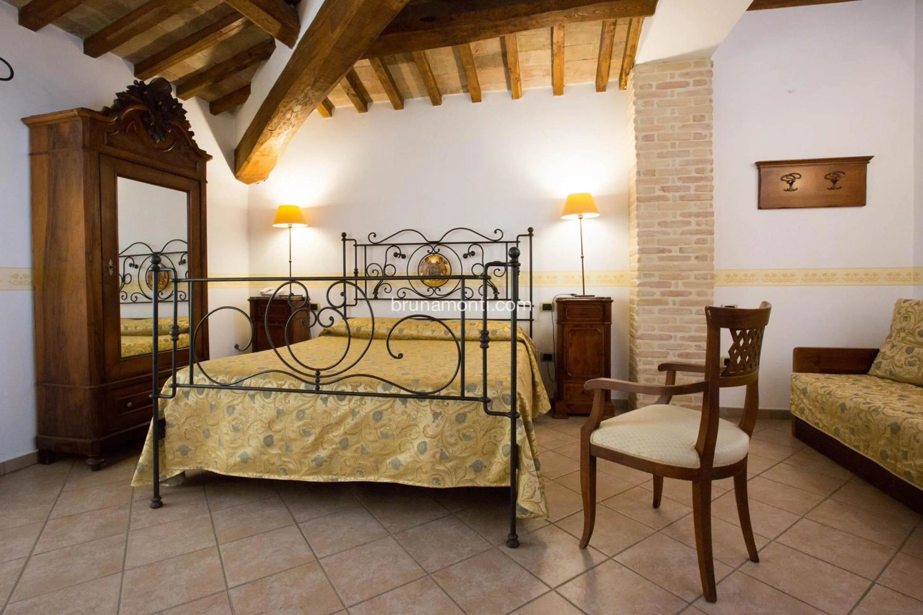 Bed in Hotel Palazzo Brunamonti