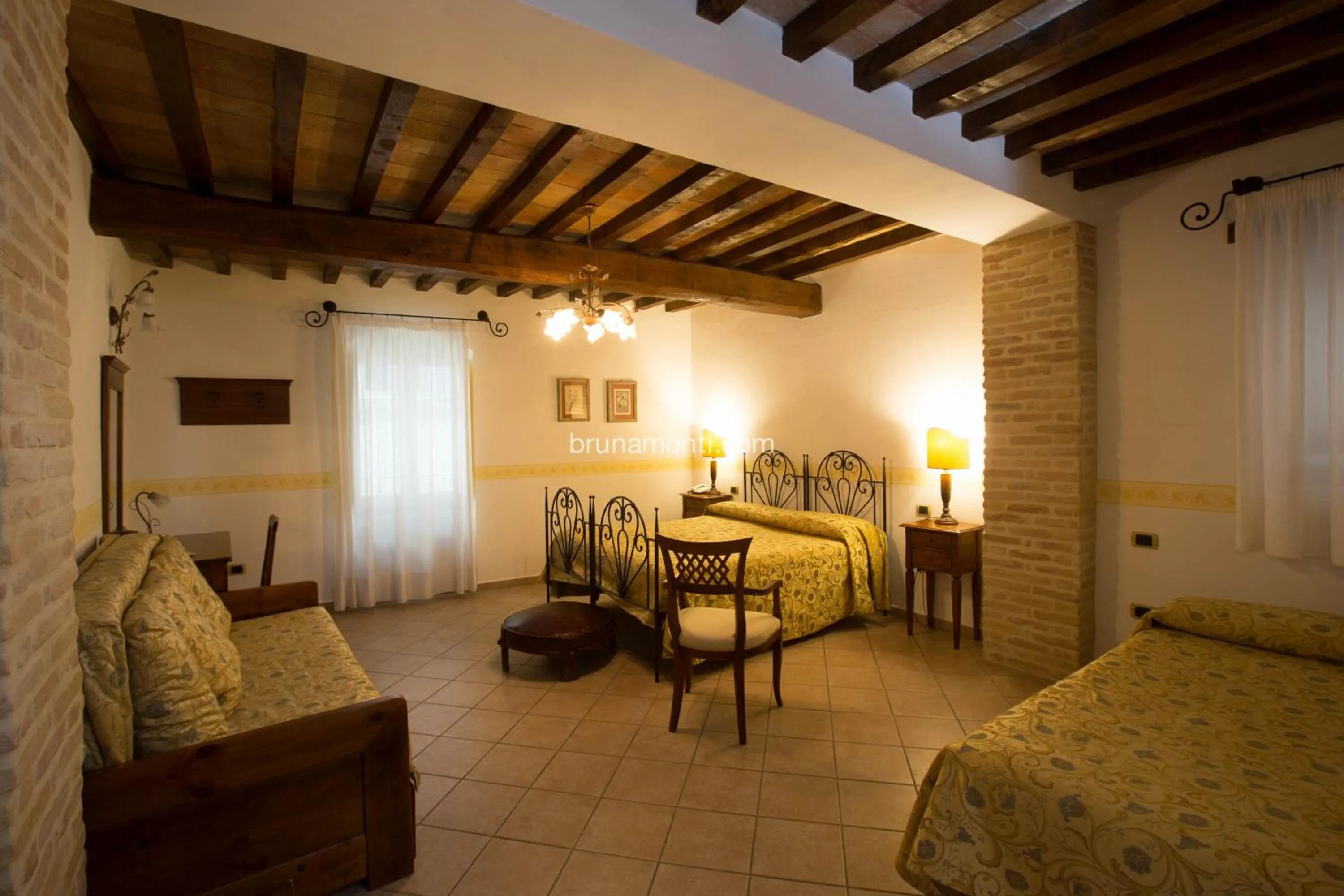 Bed in Hotel Palazzo Brunamonti