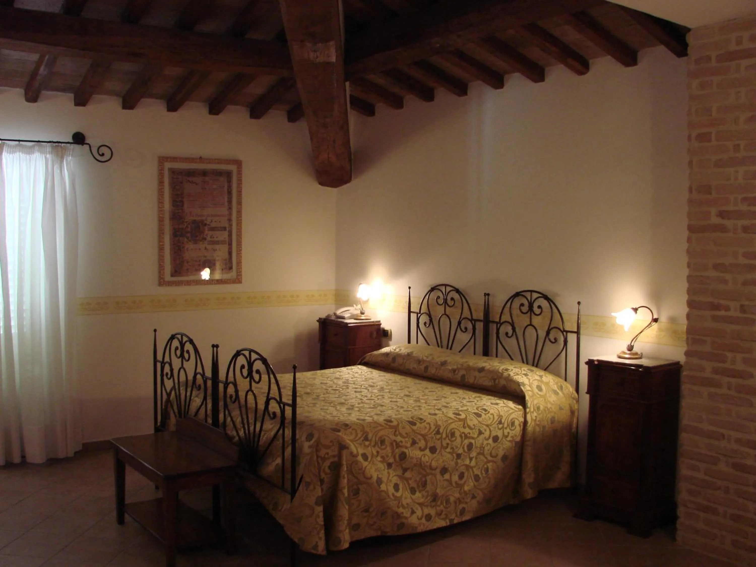 Bed in Hotel Palazzo Brunamonti
