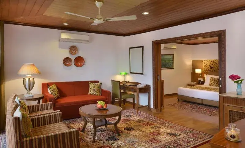 Living room, Bed in Fortune Resort Heevan, Srinagar - Member ITC Hotels' Group Living room, Bed in Fortune Resort Heevan, Srinagar - Member ITC Hotels' Group