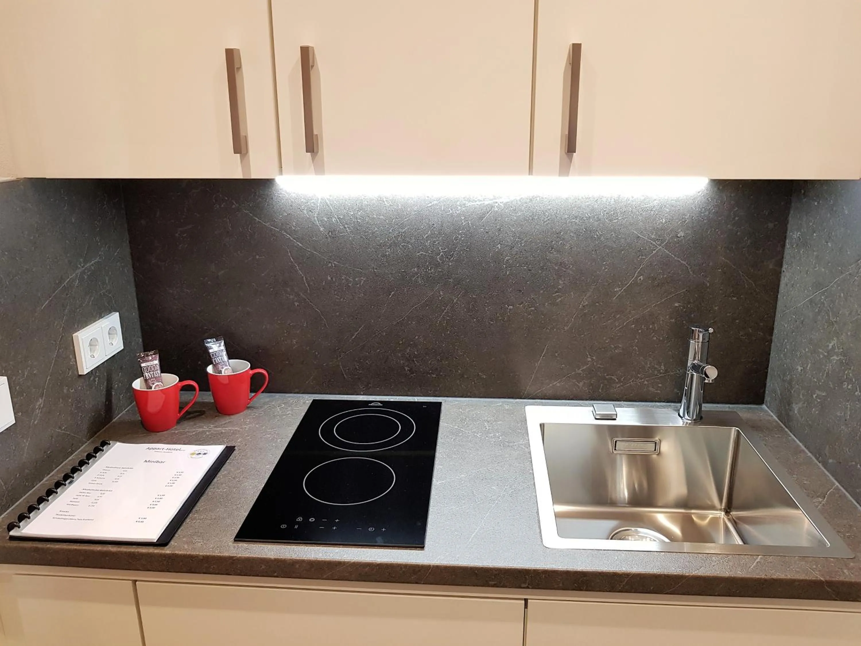 Kitchen or kitchenette in Apparthotel Garni Superior Simsseeblick