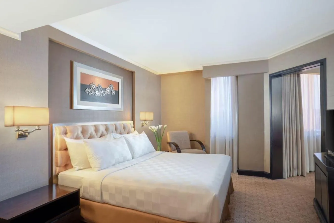 Bed in Hotel Ciputra Semarang managed by Swiss-Belhotel International