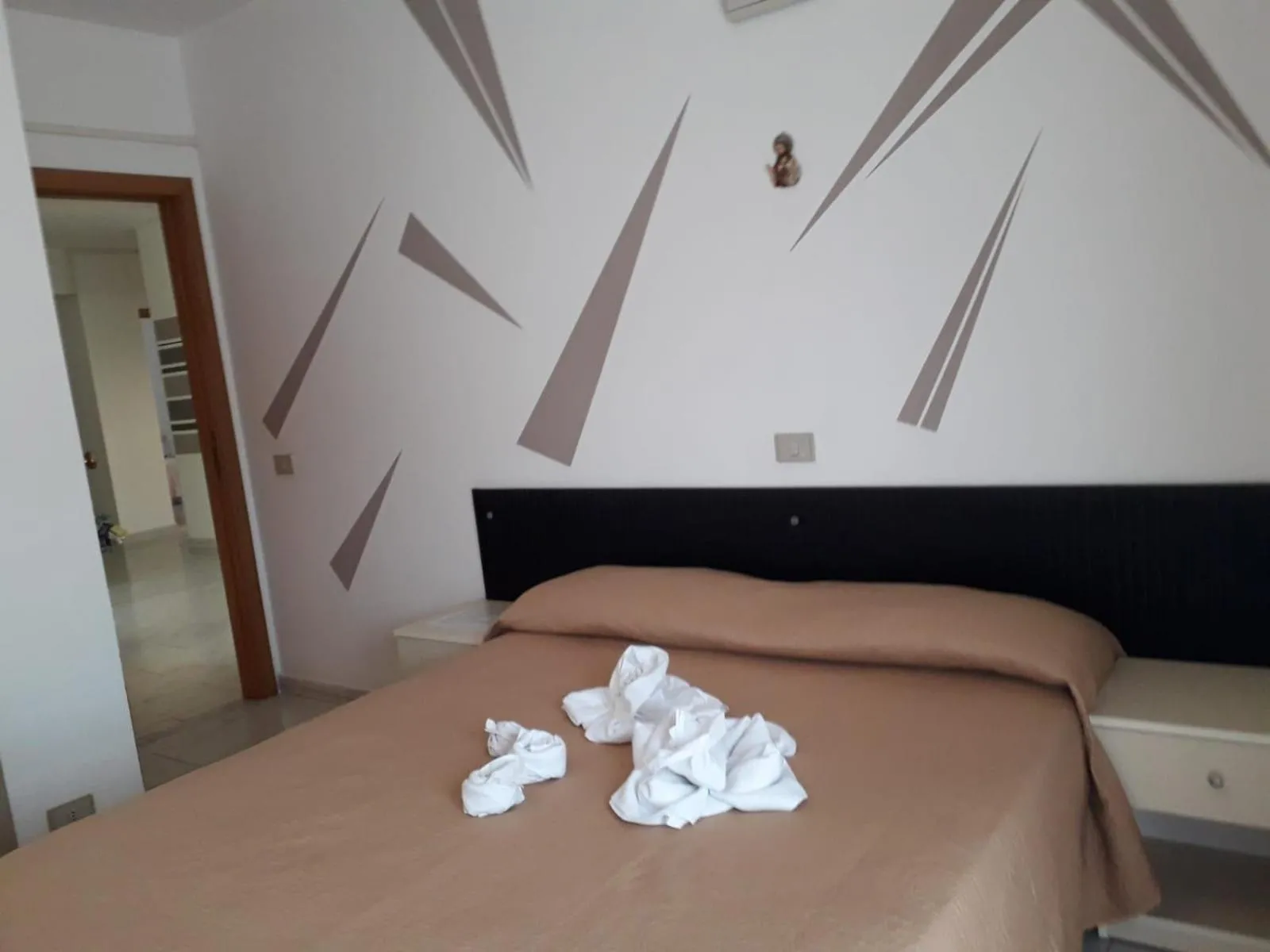 Bed in Hotel Santa Caterina