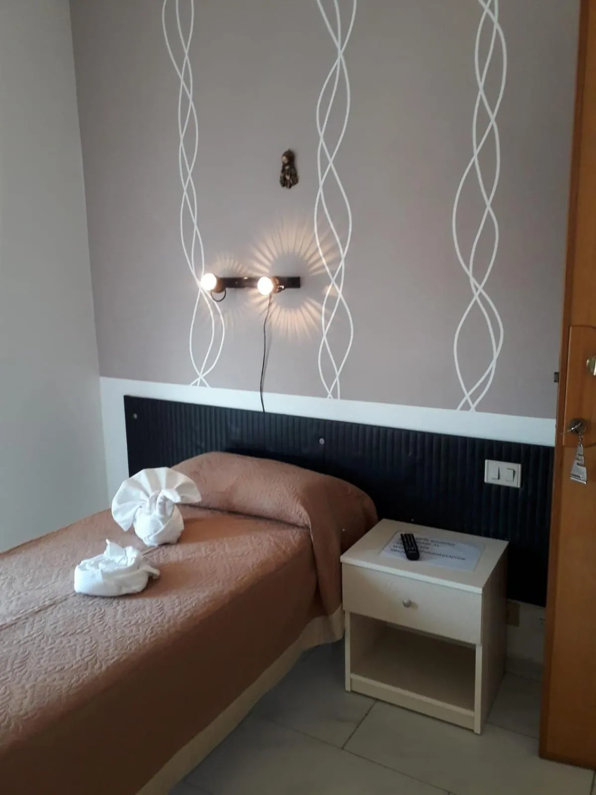 Bed in Hotel Santa Caterina