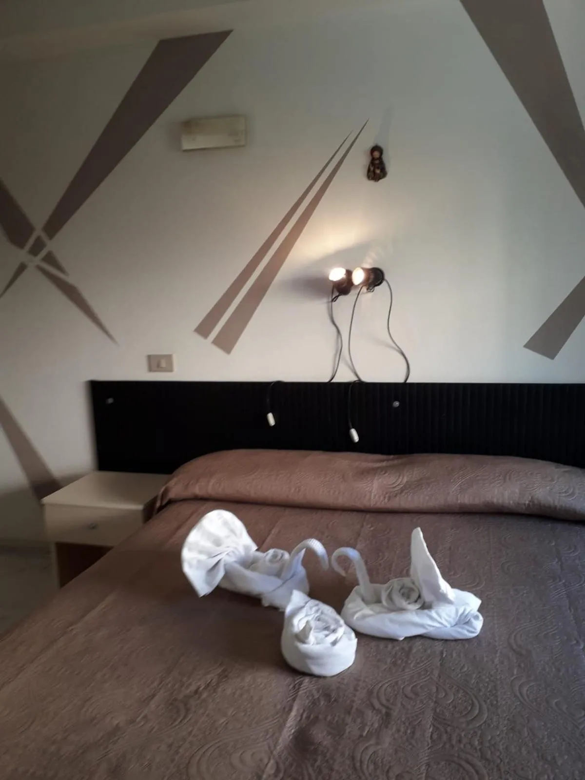 Bed in Hotel Santa Caterina