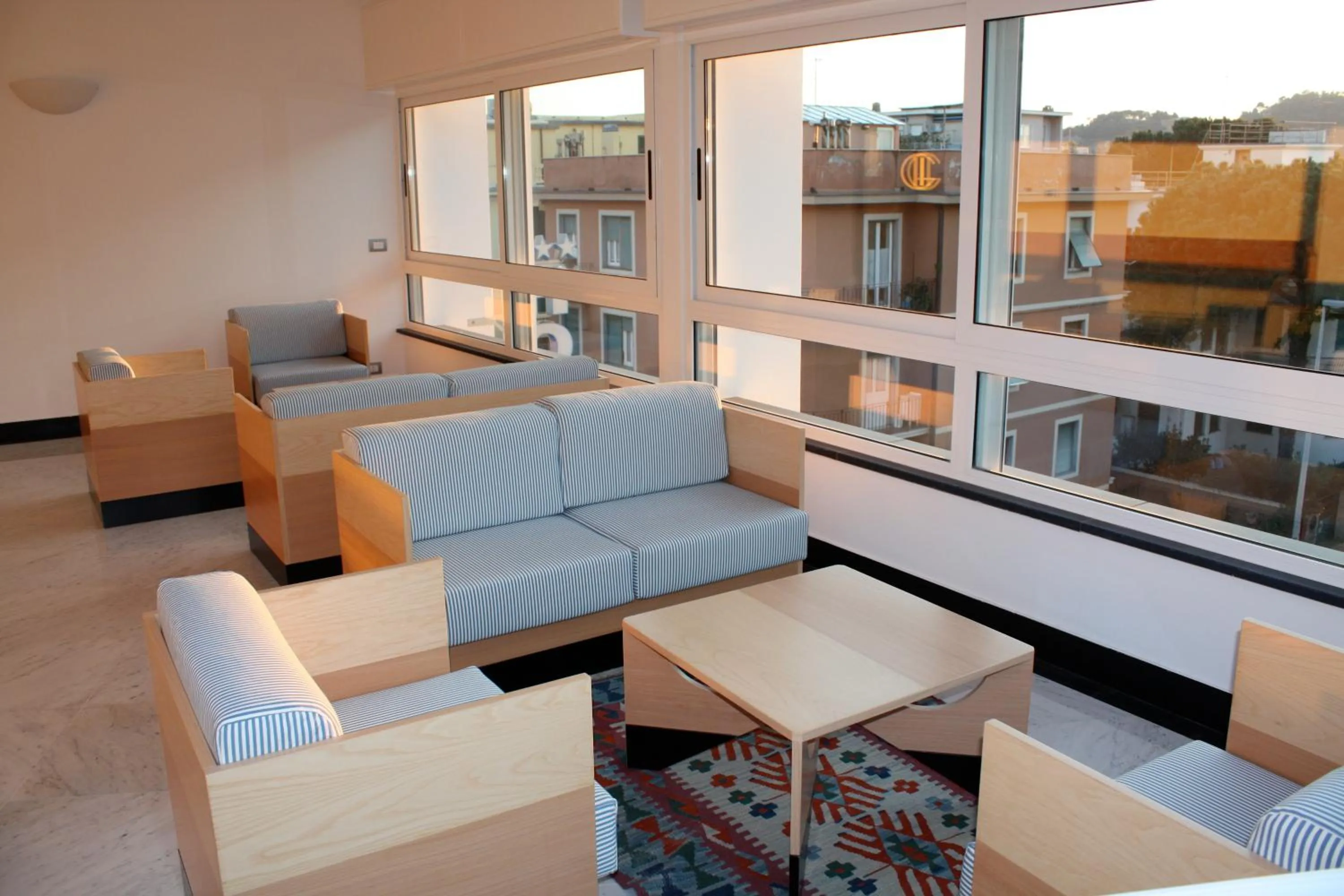 Communal lounge/ TV room in Hotel Genova