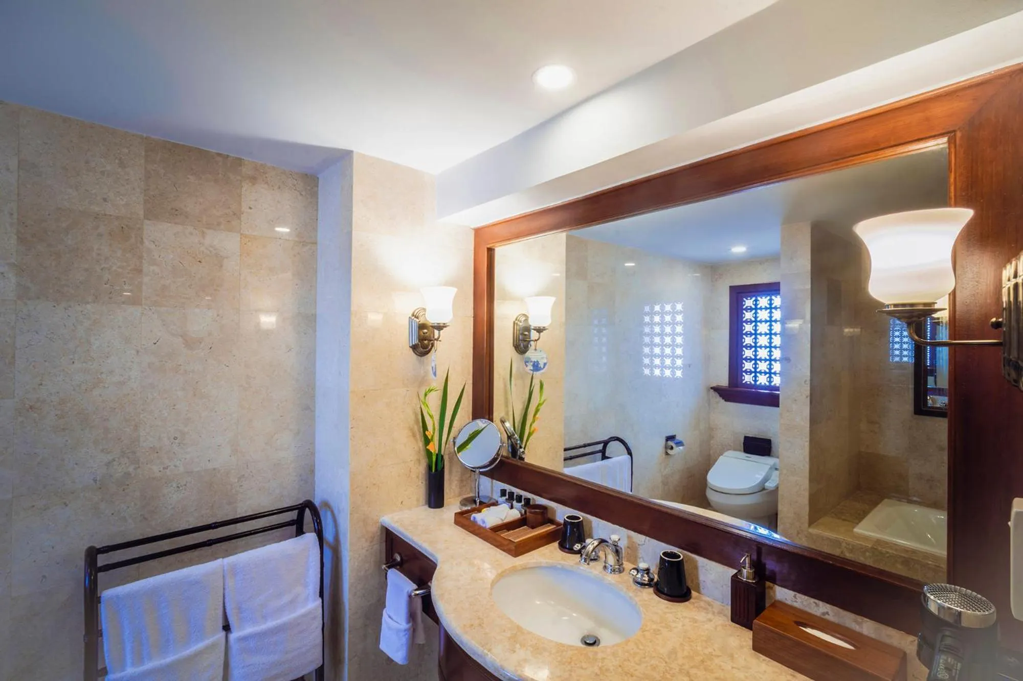 Bathroom, Bed in Furama Resort Danang