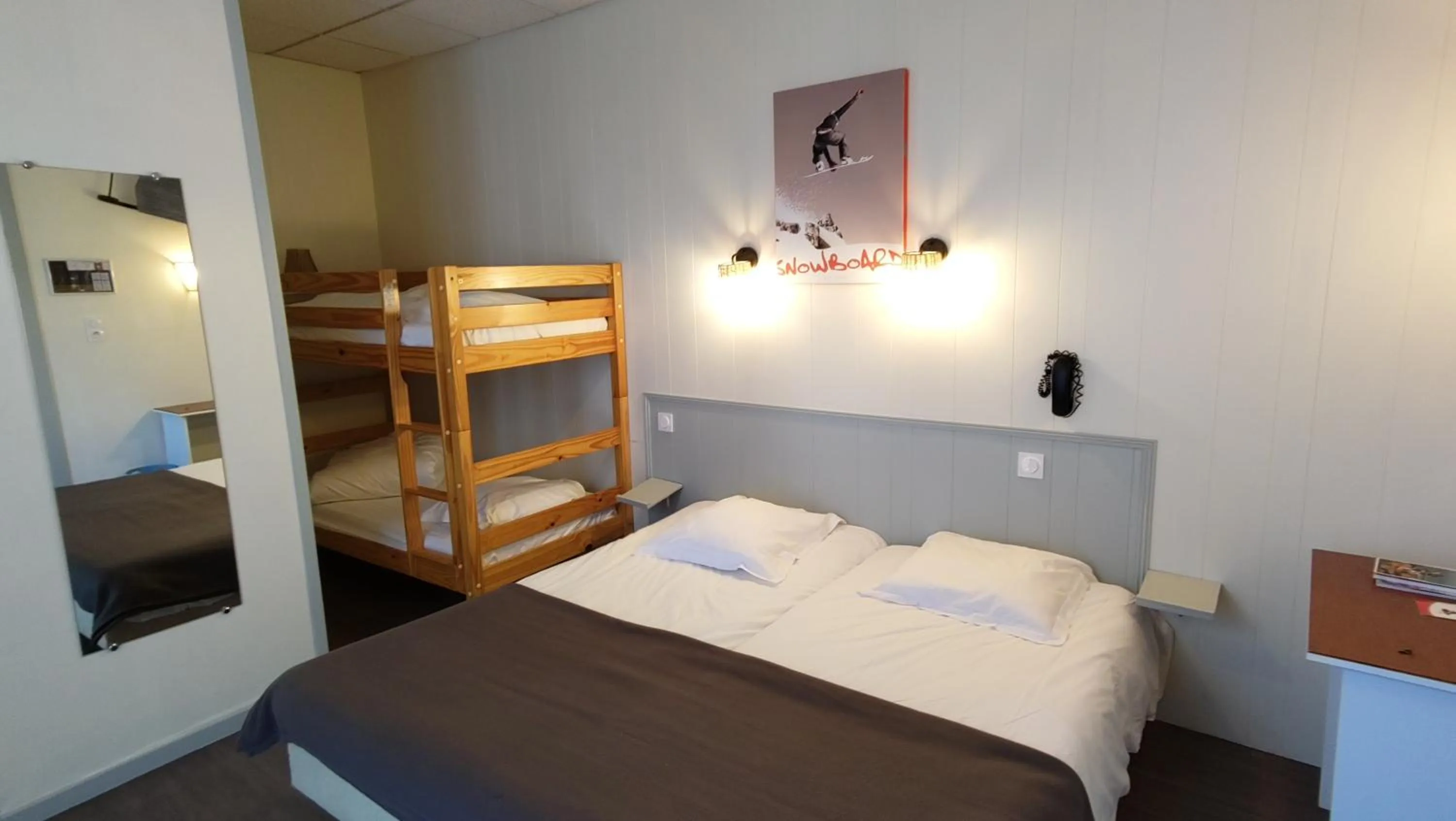 Bed in Hotel Le Colibri