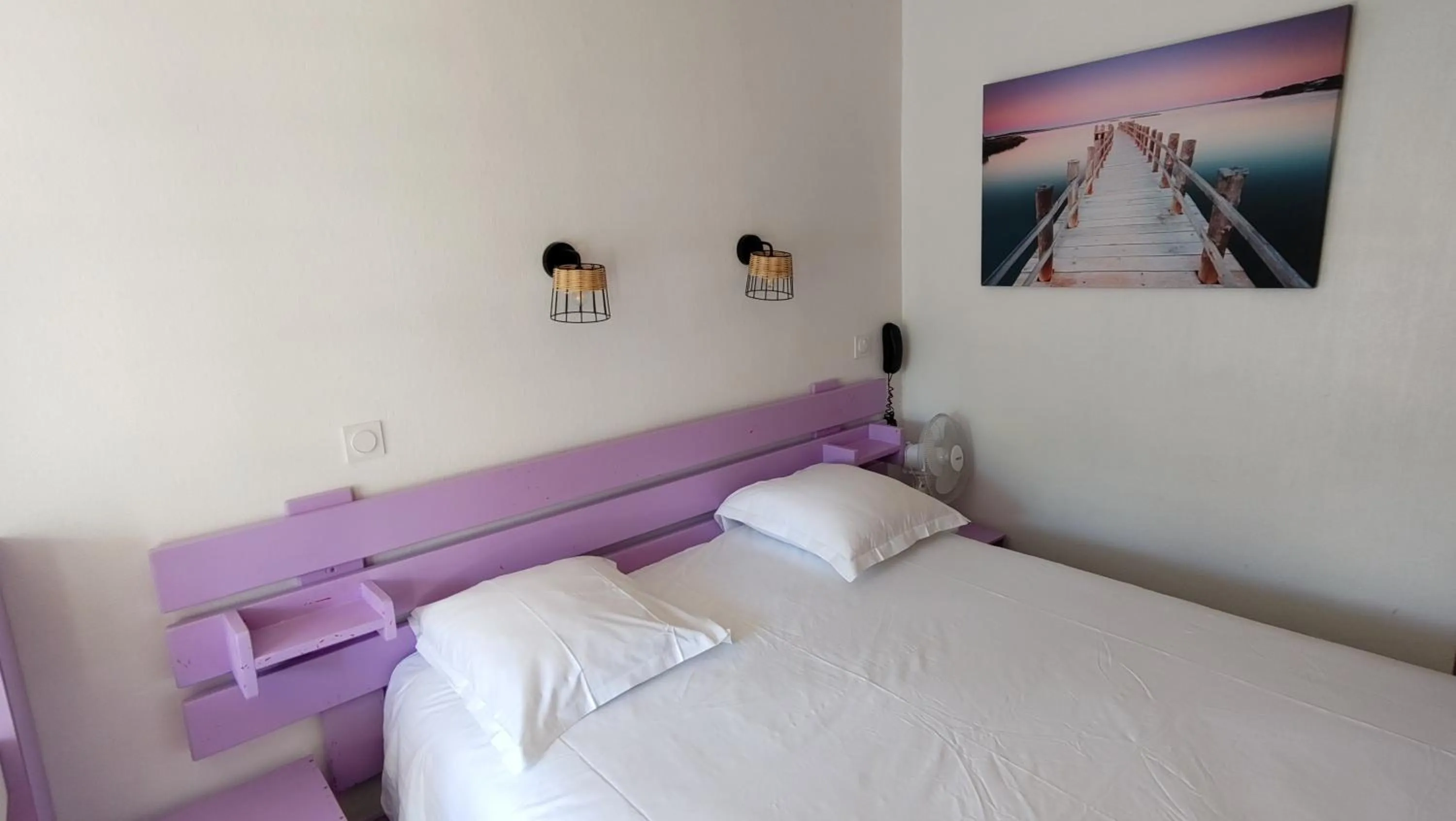 Bed in Hotel Le Colibri