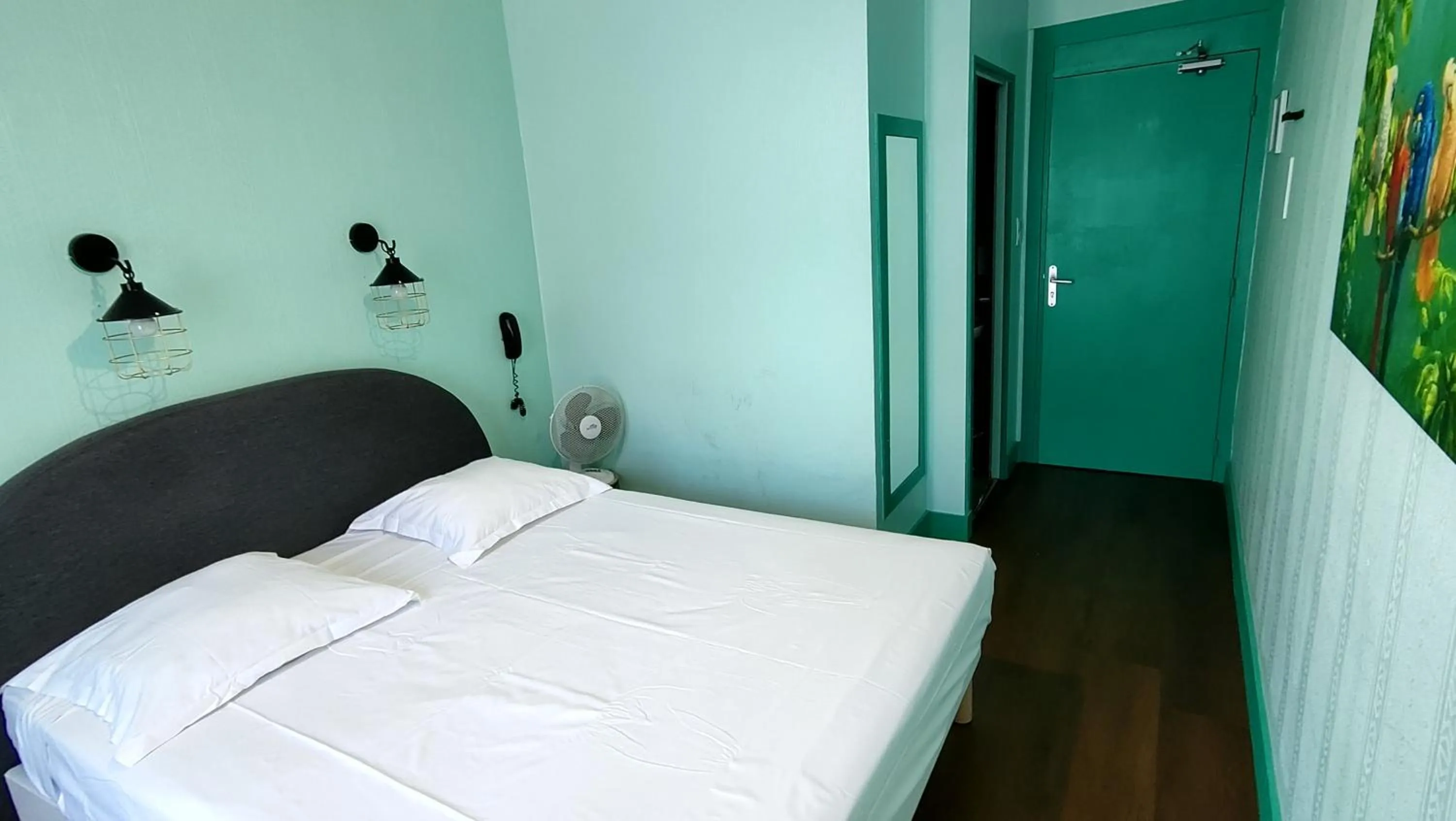 Bed in Hotel Le Colibri