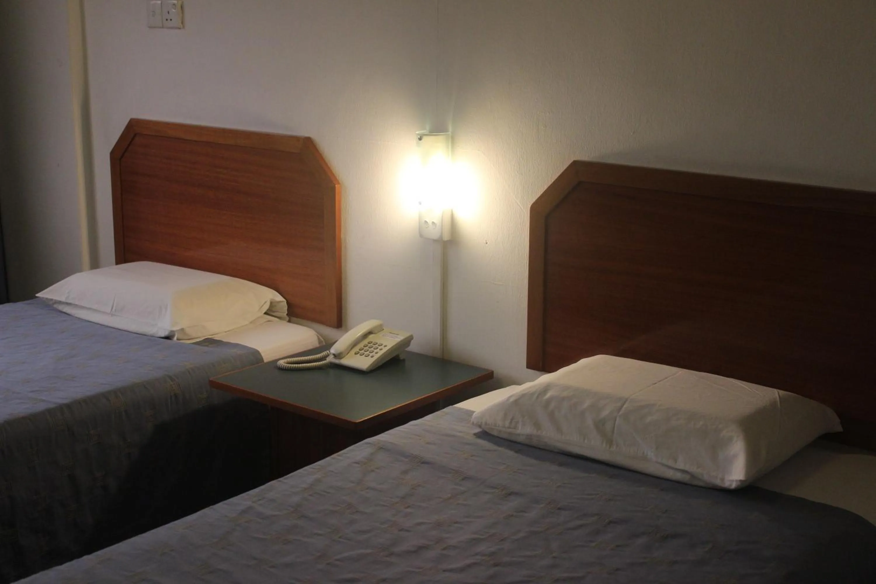 Bed in Hotel Supreme