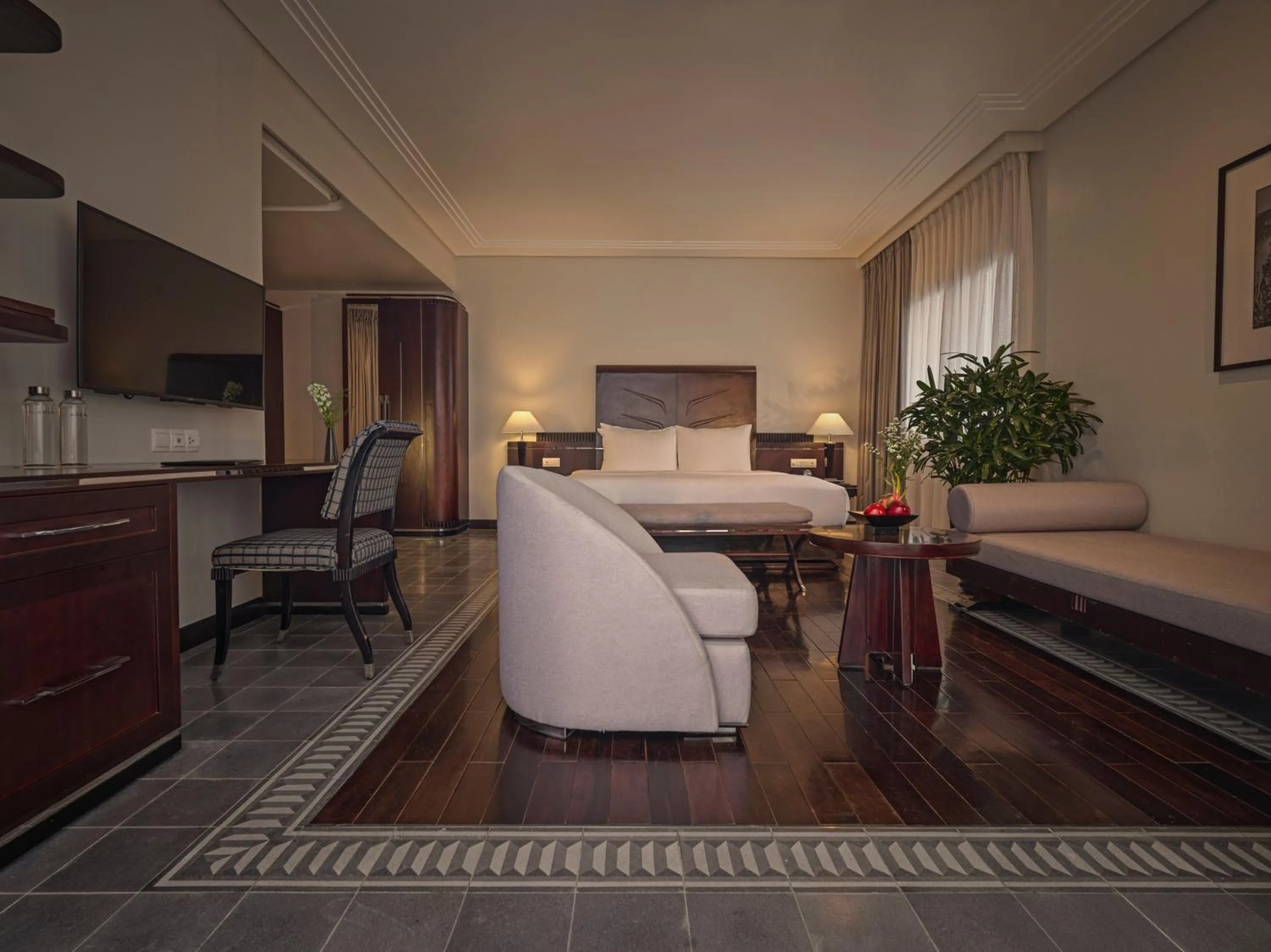 Seating area, Bed in Azerai La Residence, Hue