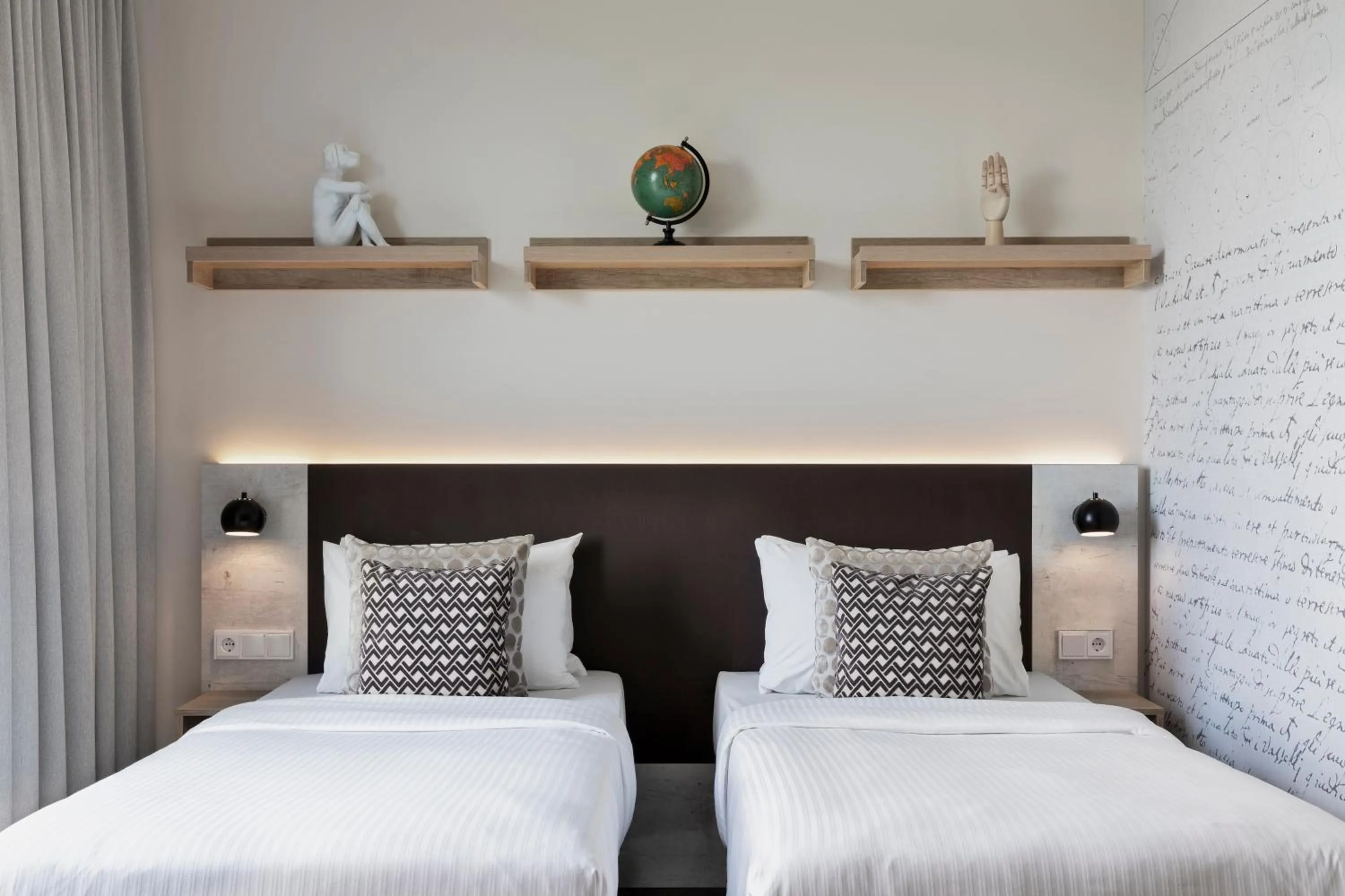 Bed in Stellaris Apartment Hotel