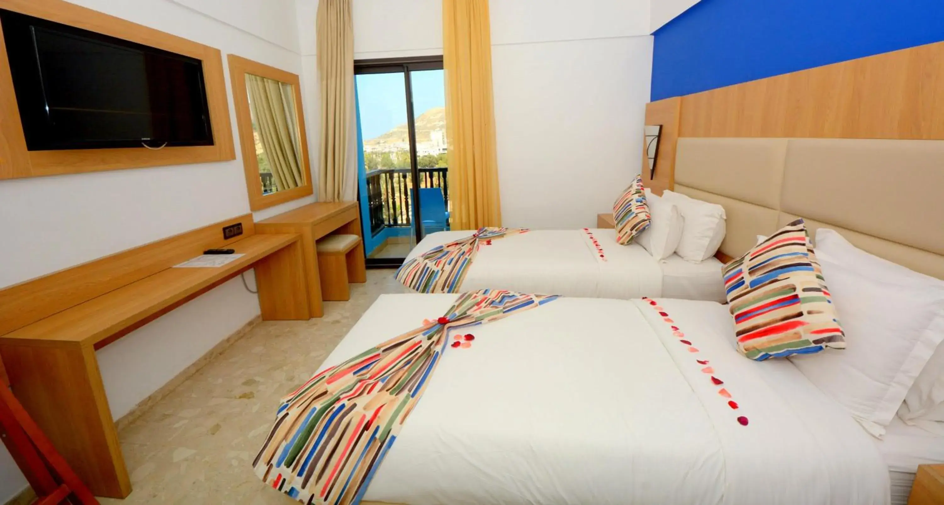 Bed in Oasis Hotel & Spa Bed in Oasis Hotel & Spa