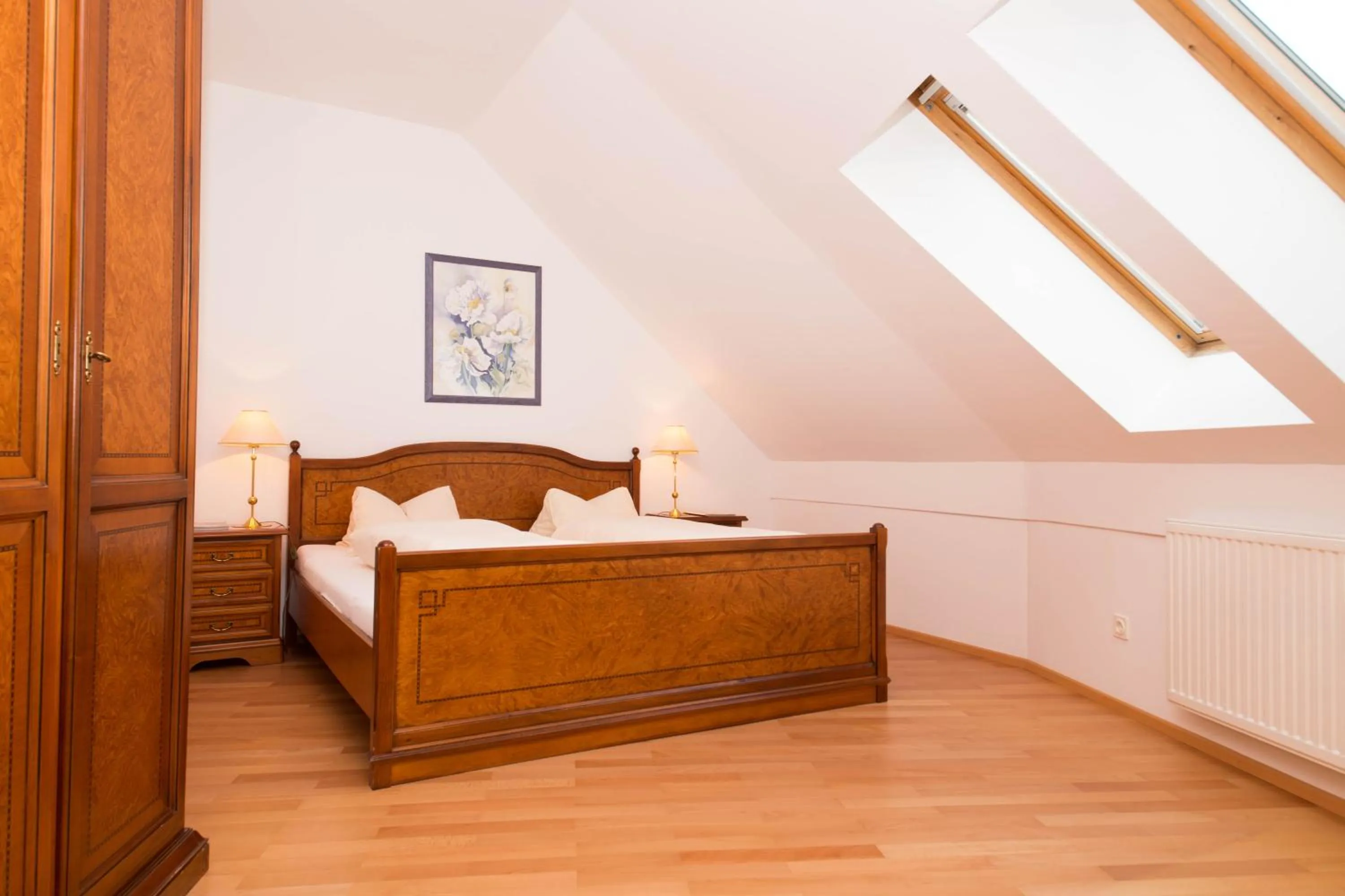 Bed in Werzer Strandcasino Hotel