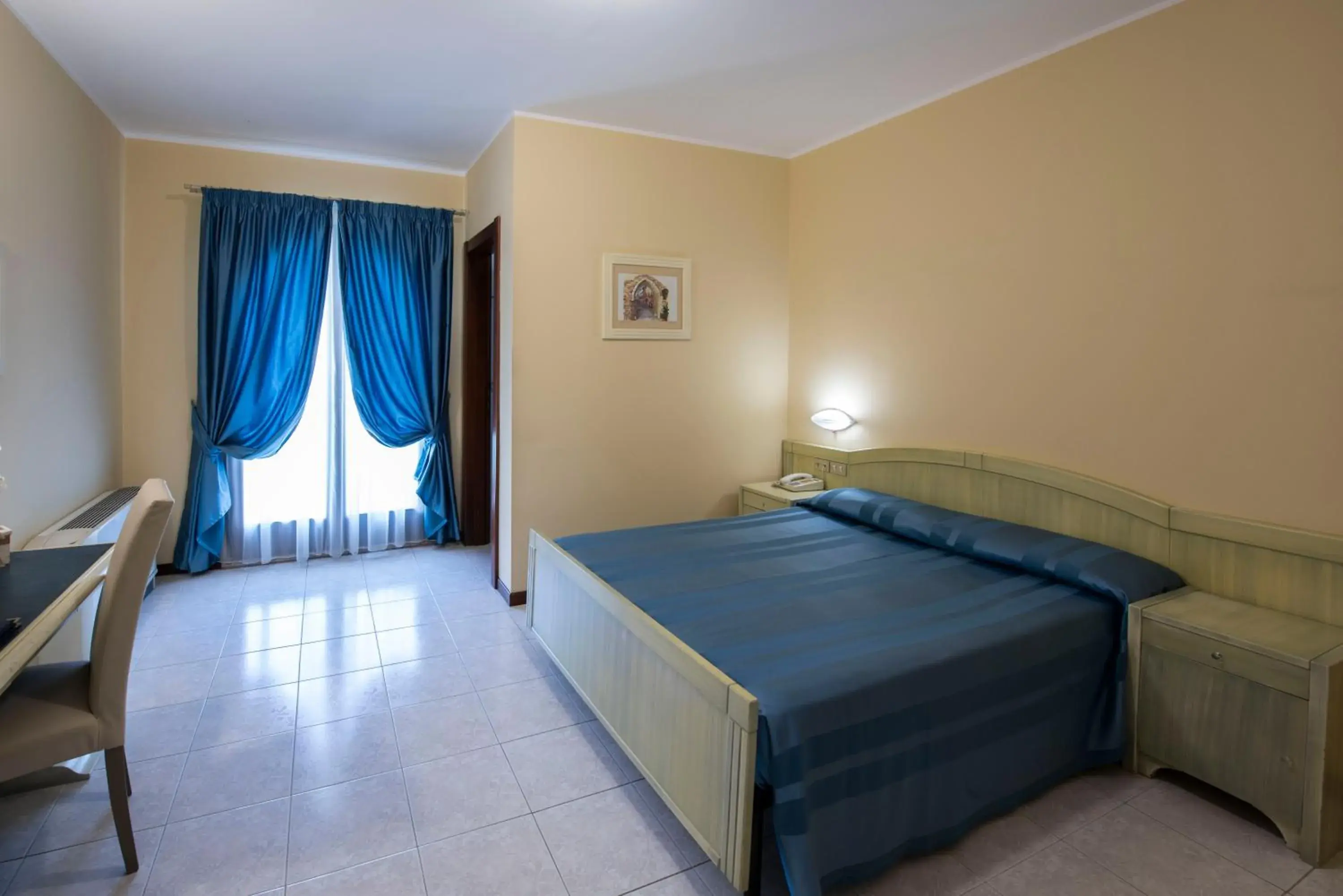 Photo of the whole room, Bed in Hotel Cristoforo Colombo Photo of the whole room, Bed in Hotel Cristoforo Colombo