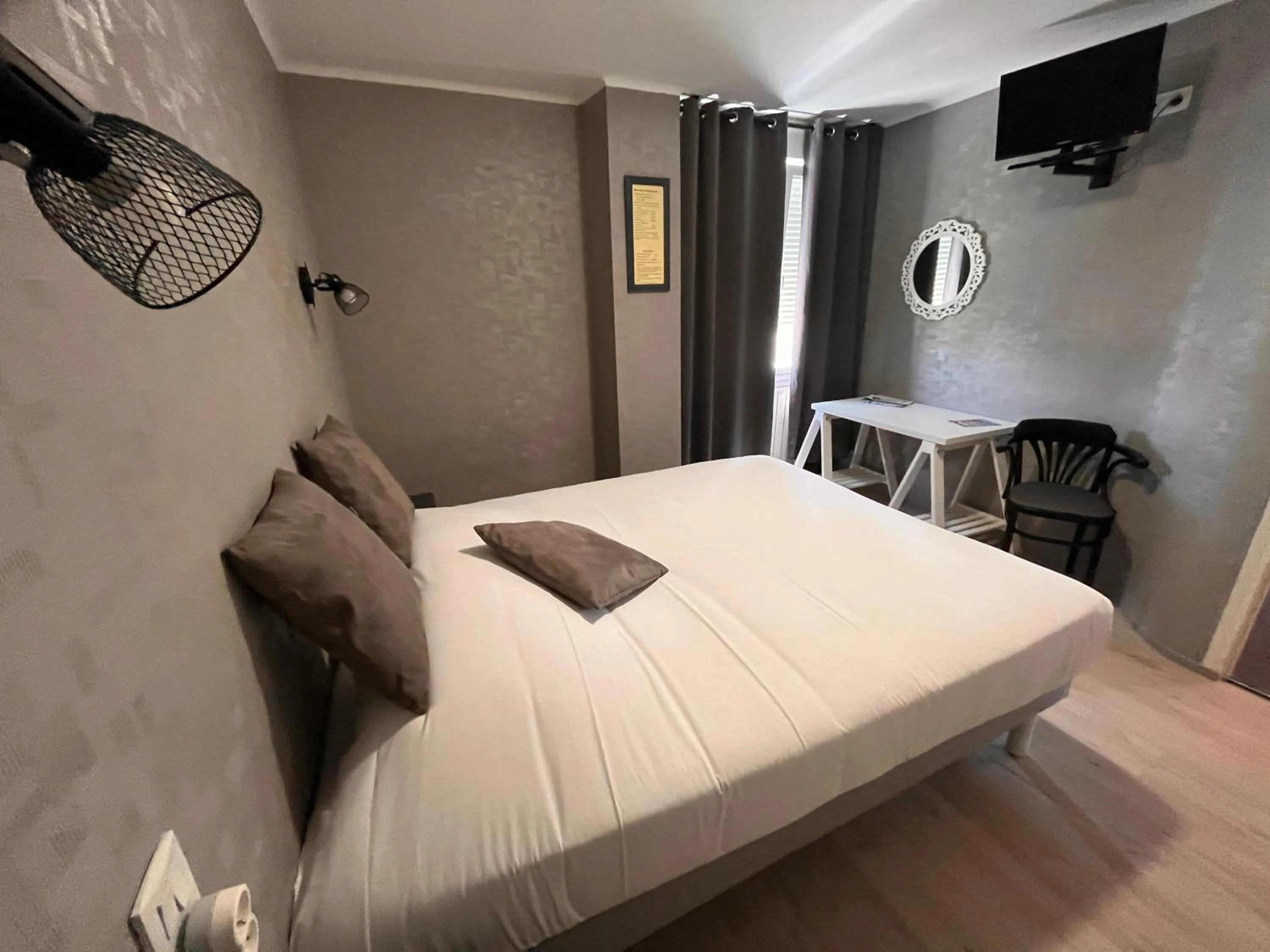 Bed in Hôtel des îles