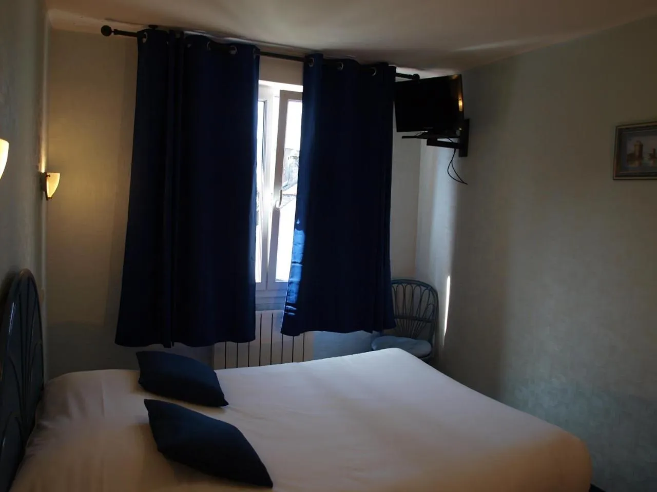 Bed in Hôtel des îles