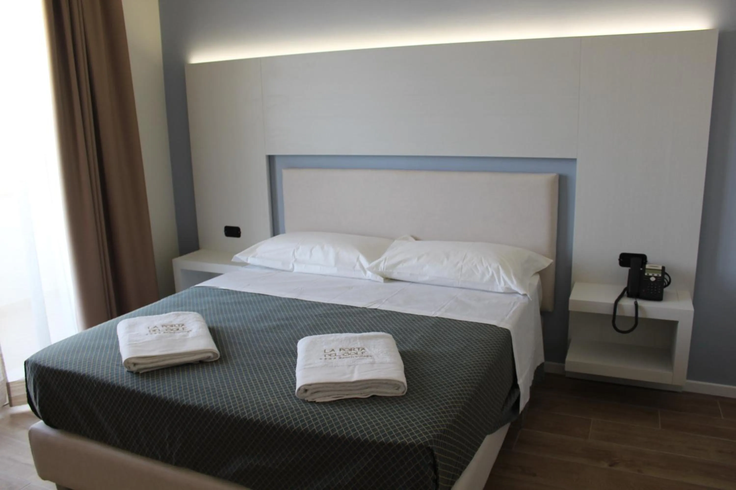 Bed in La Porta del Sole Hotel & Village