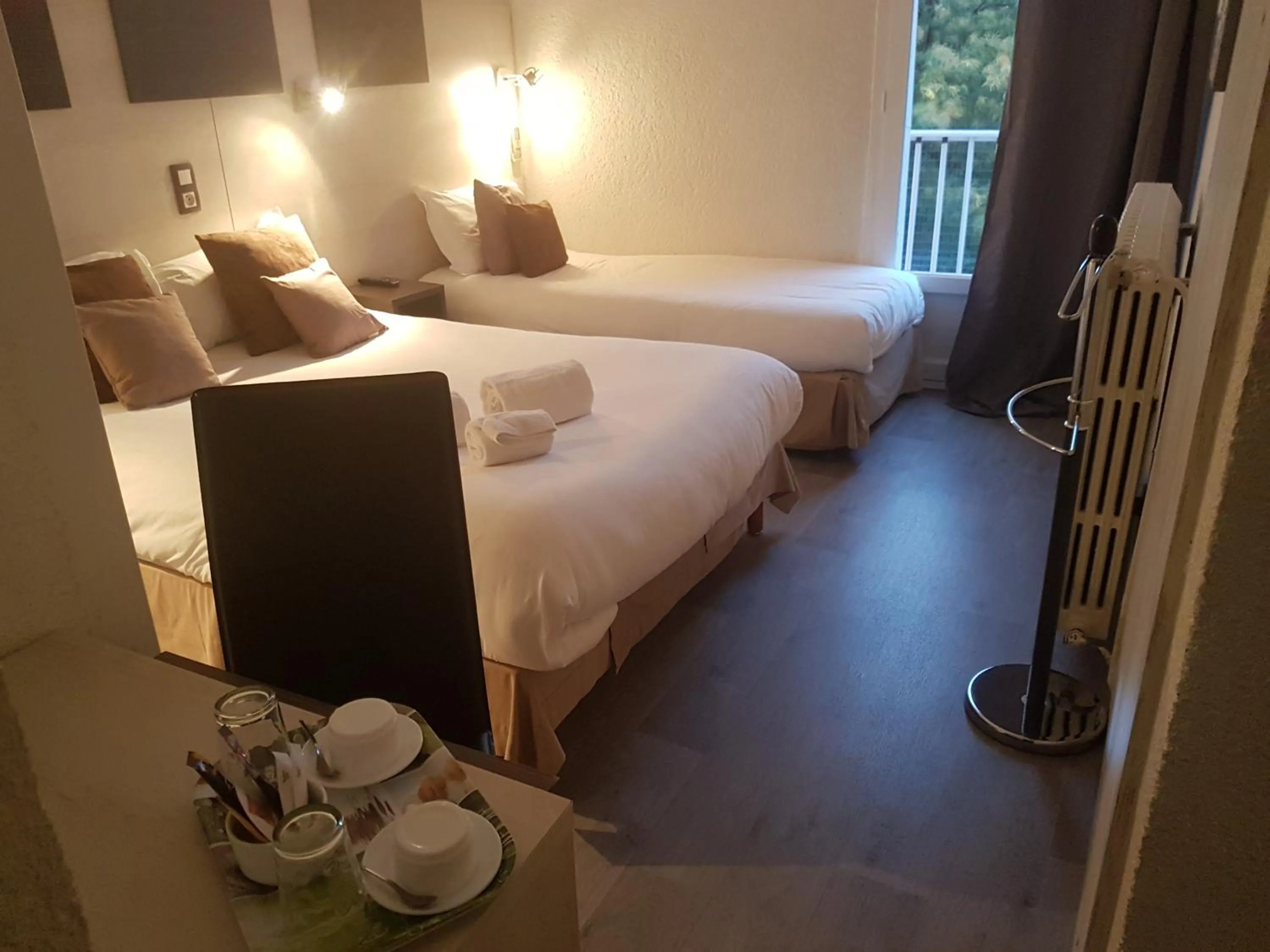 Photo of the whole room, Bed in Logis Hôtel Restaurant les Charmettes