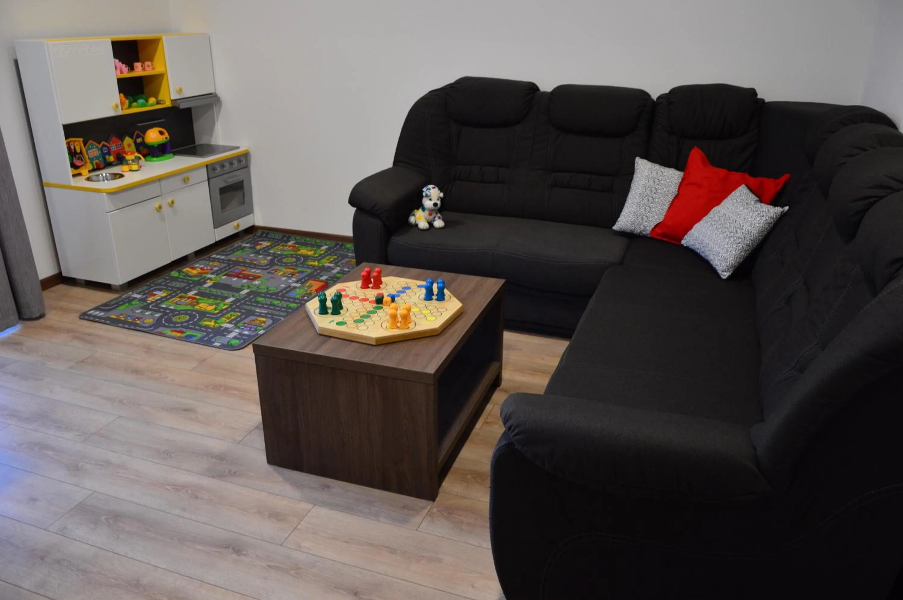 Communal lounge/ TV room in Apartmánový Dom Kriváň