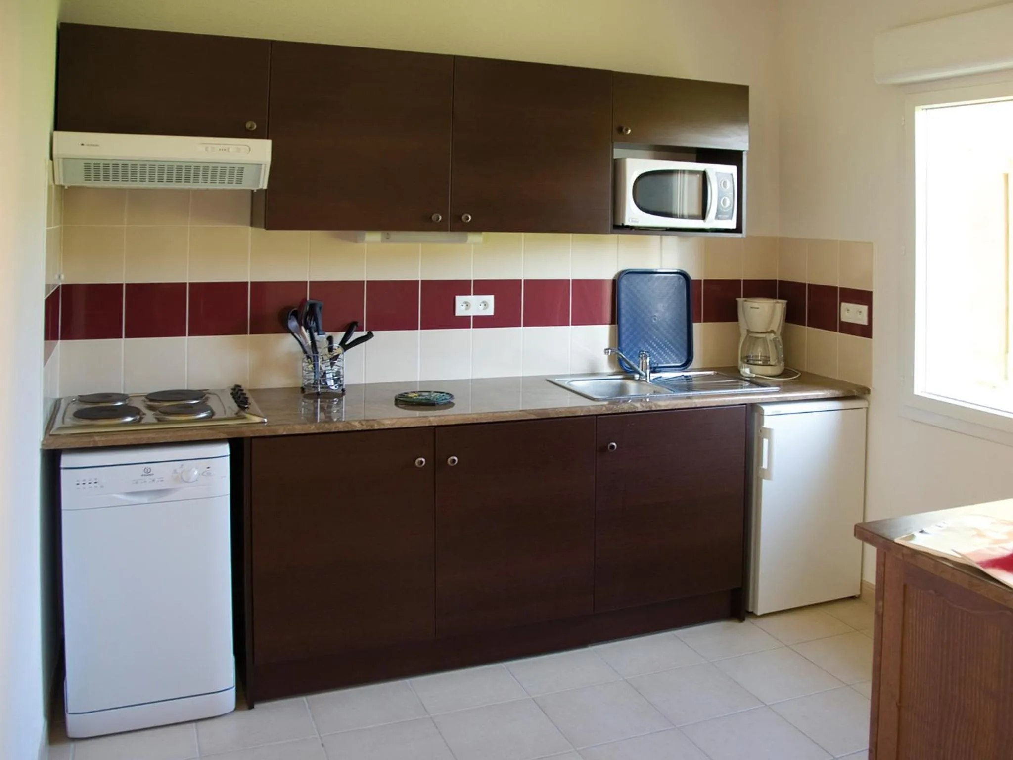 Kitchen or kitchenette in Lagrange Vacances Le Clos des Vignes
