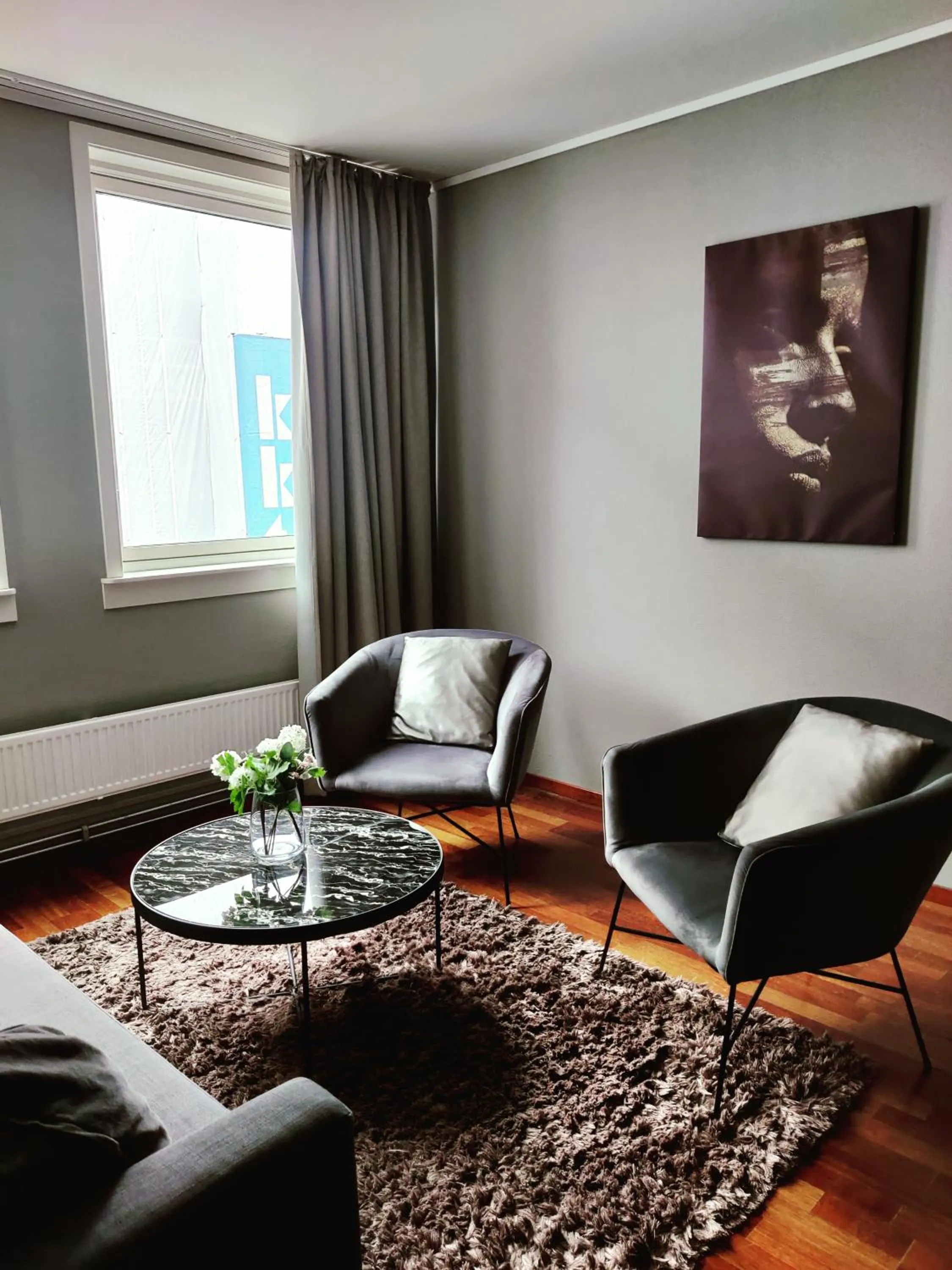 Living room in First Hotel Millennium