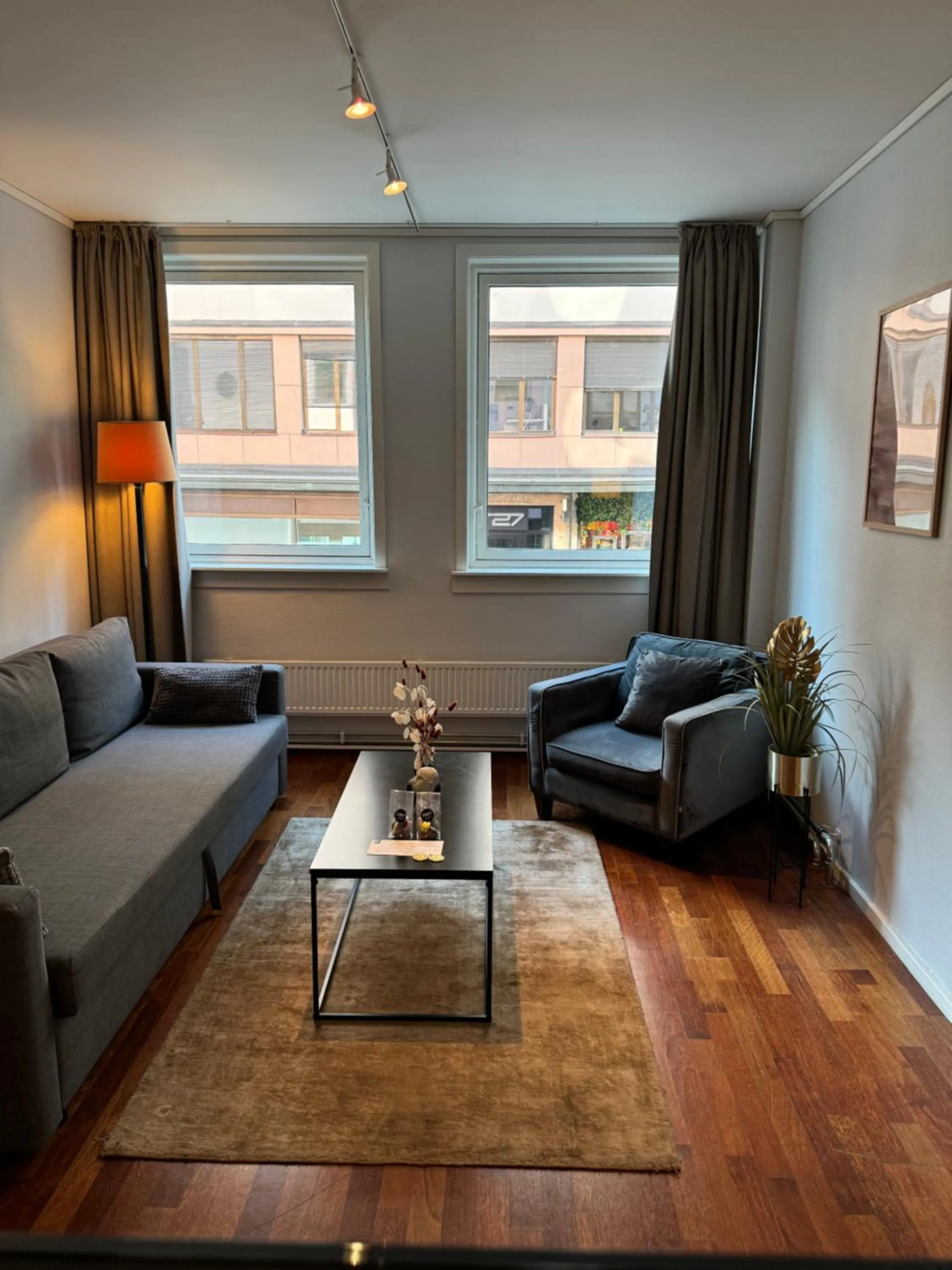 Living room in First Hotel Millennium