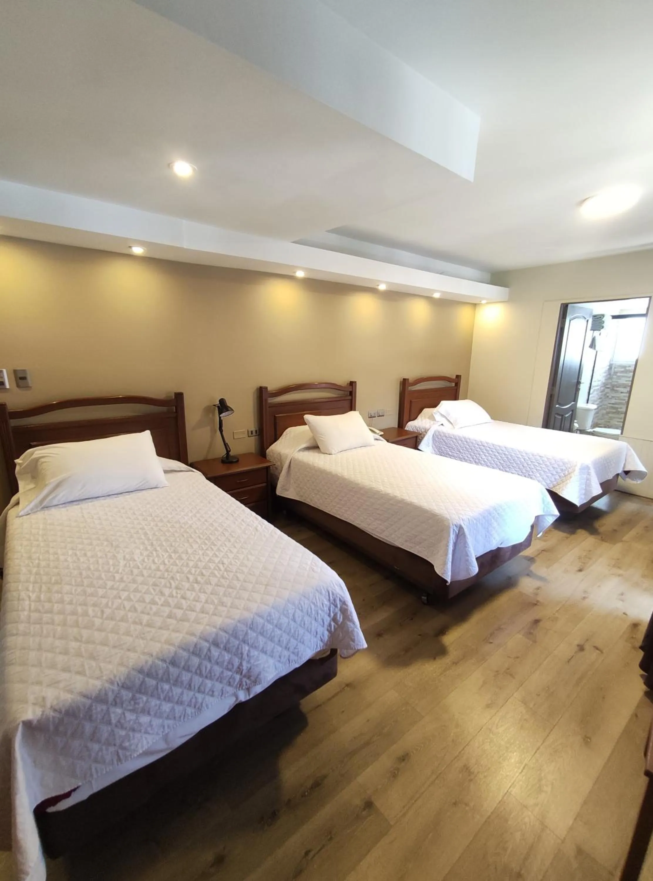 Bed in El Prado Hotel