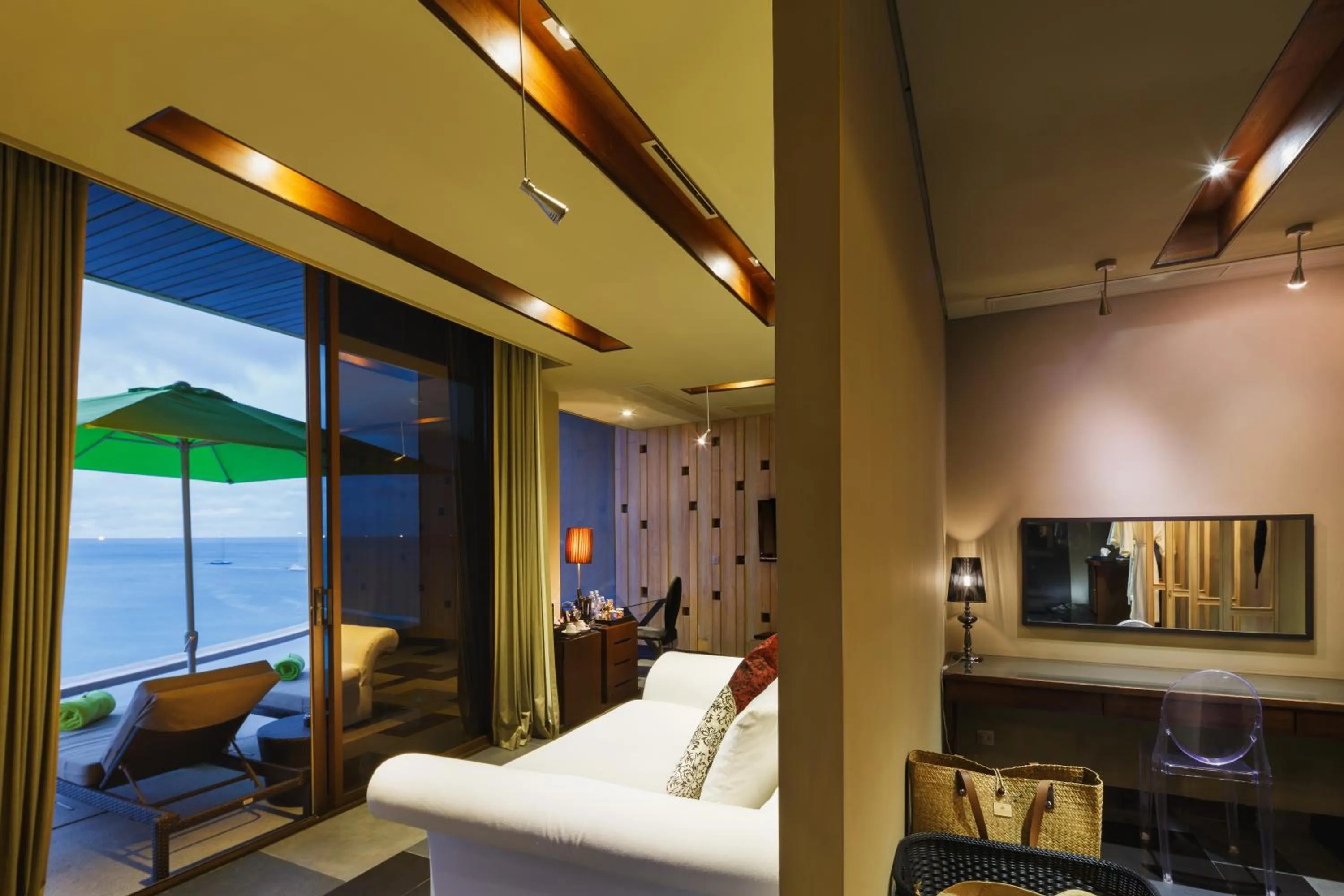 Seating area, Bed in Impiana Private Villas Kata Noi