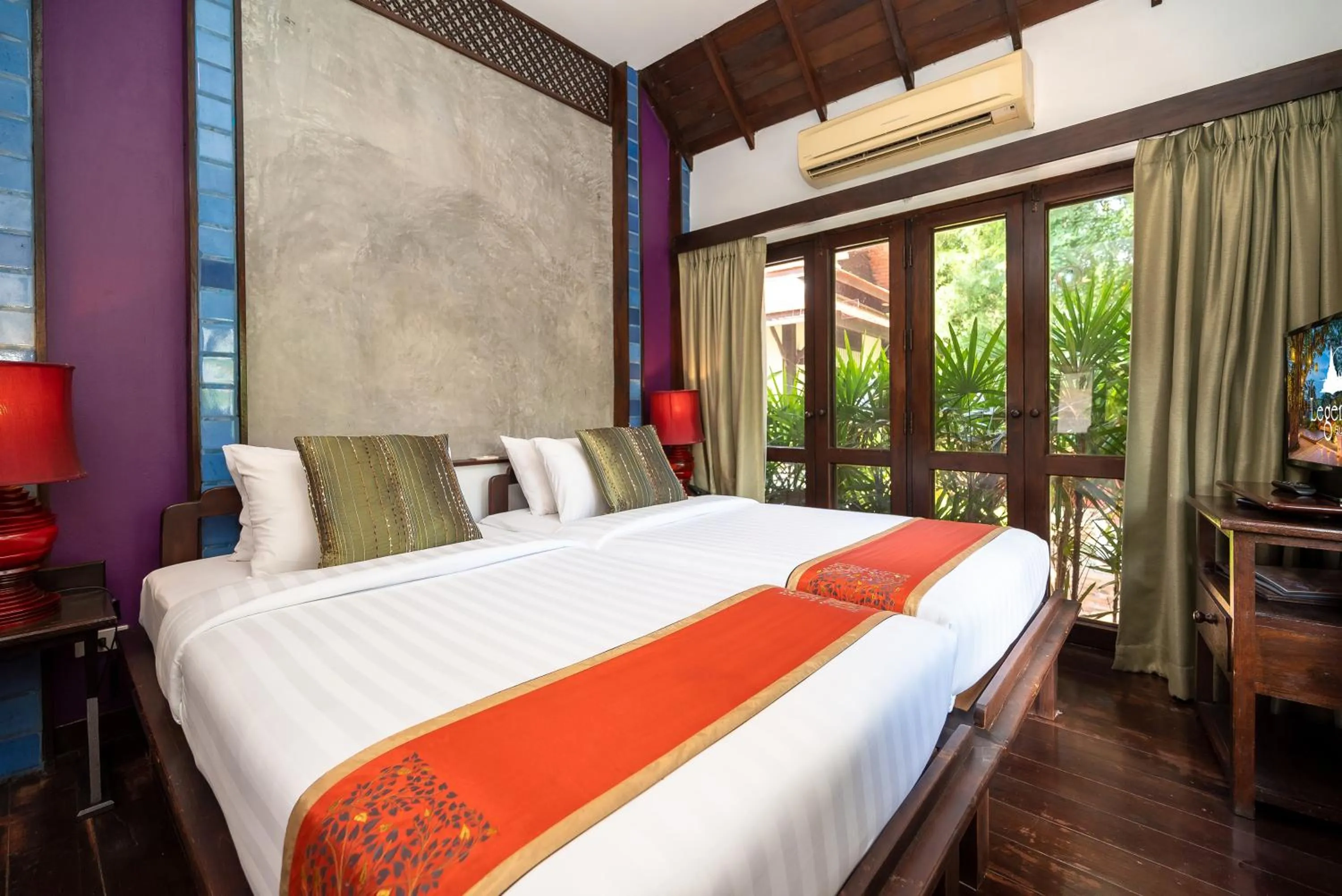 Bed in Legendha Sukhothai Hotel