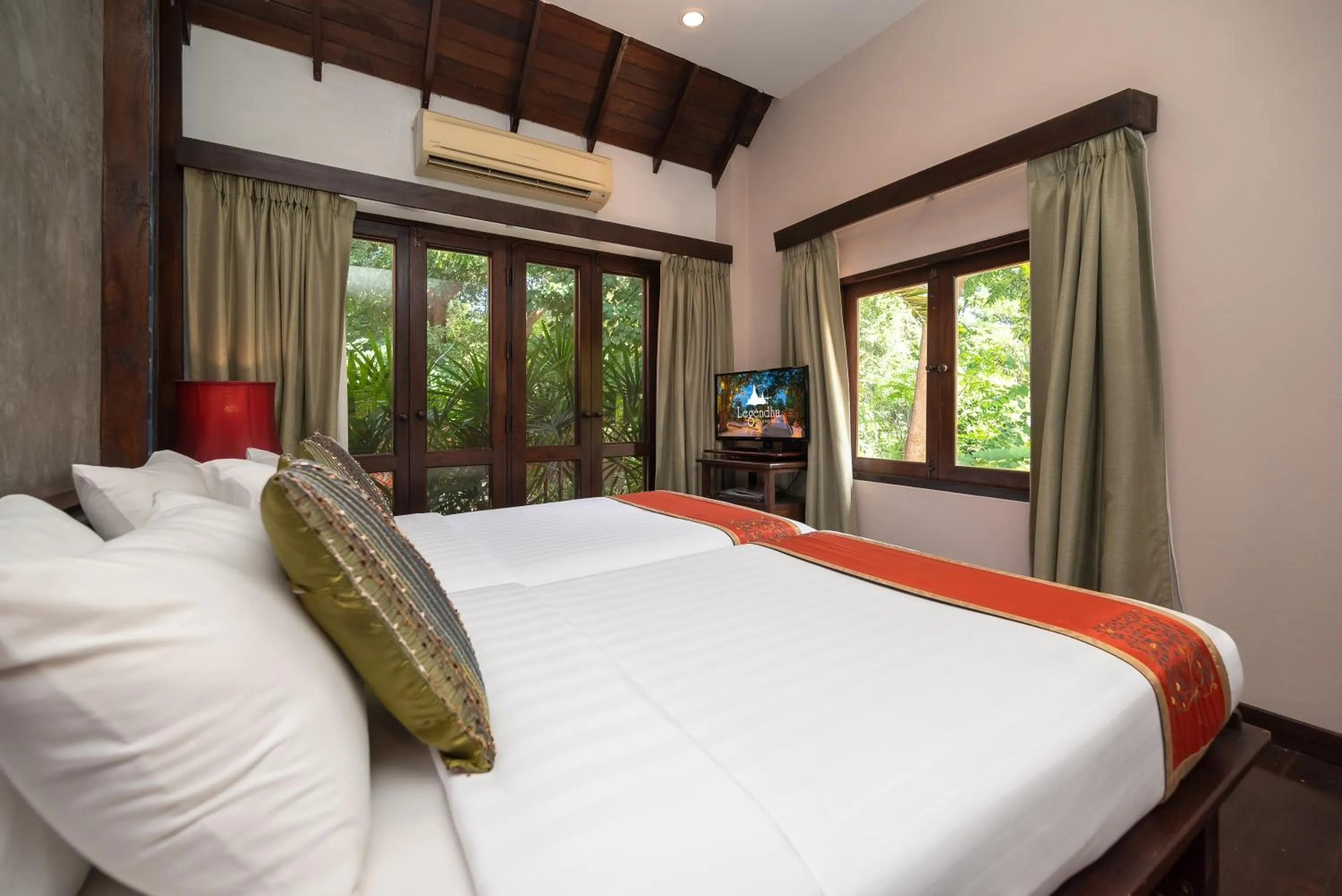 Bed in Legendha Sukhothai Hotel