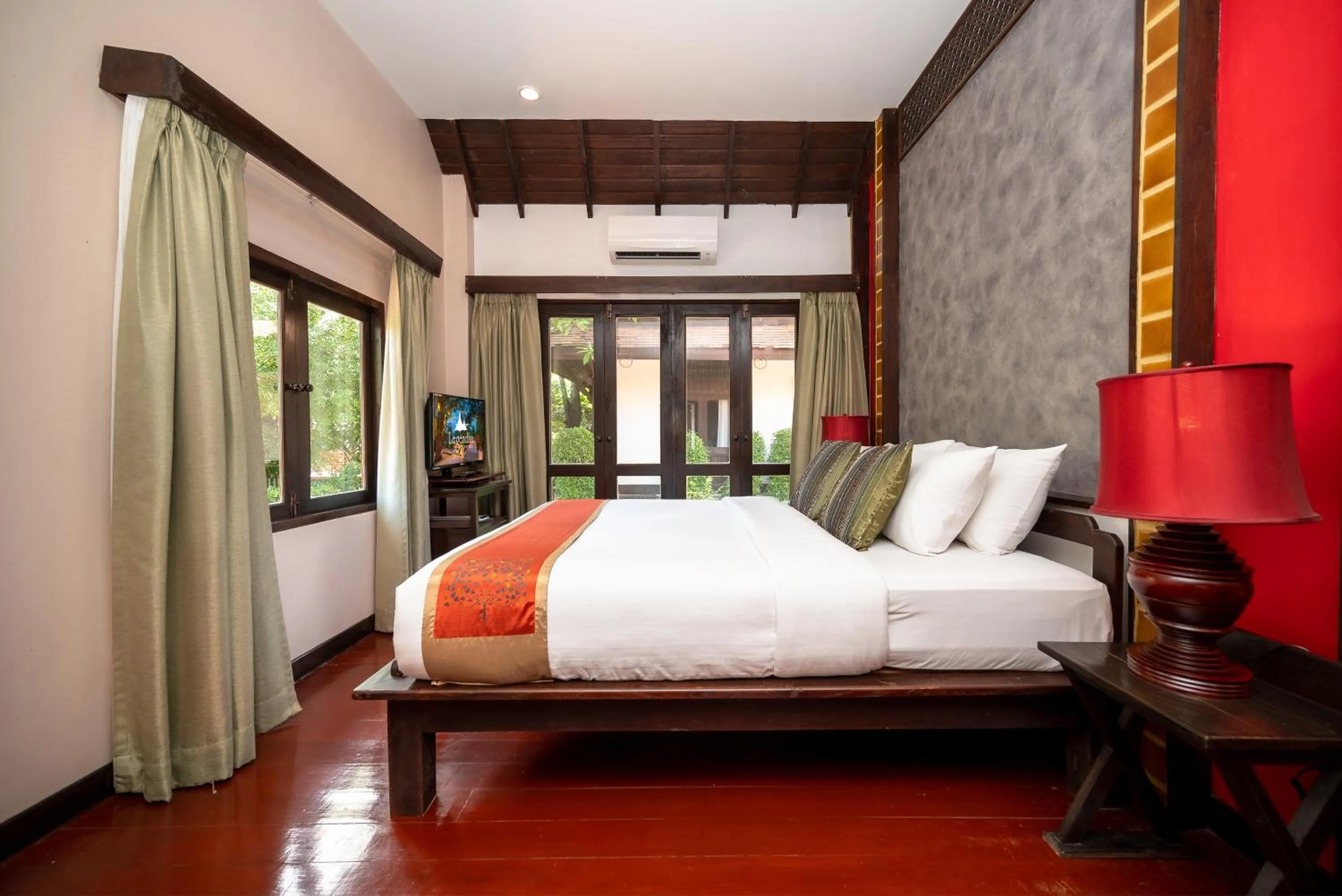 Bed in Legendha Sukhothai Hotel