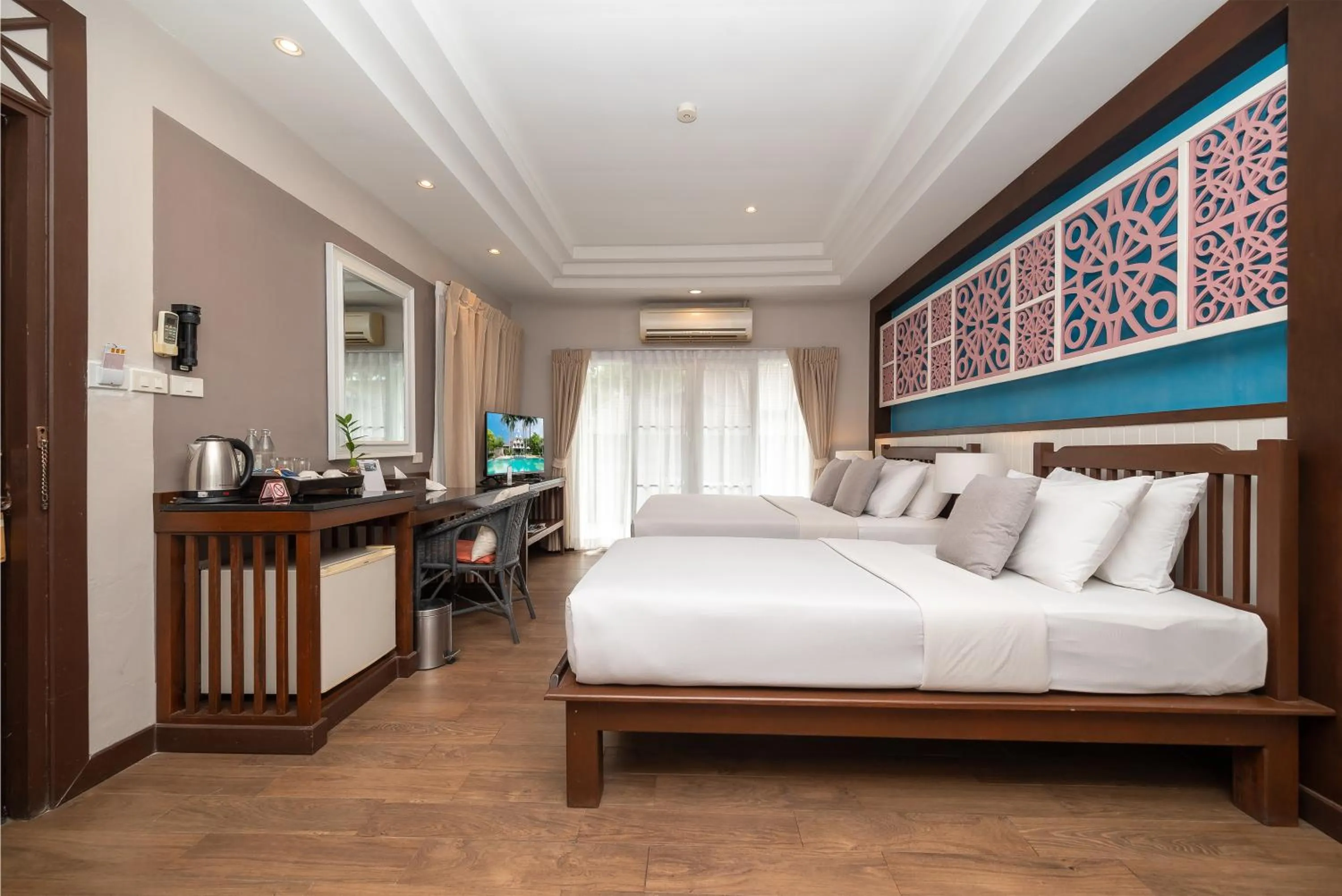 Bed in Le Charme Sukhothai Historical Park