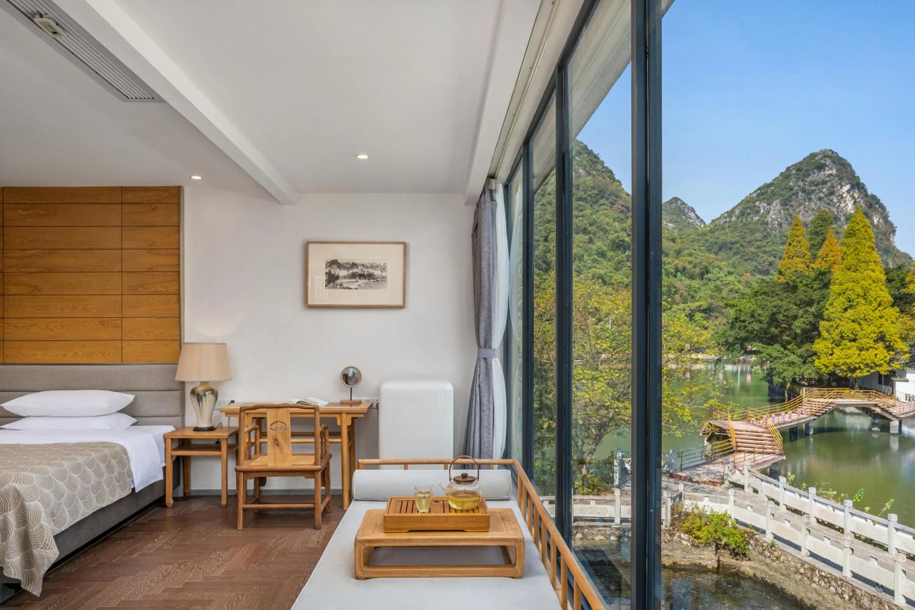 Seating area, Bed in Guilin HeShe Lakeside Resort