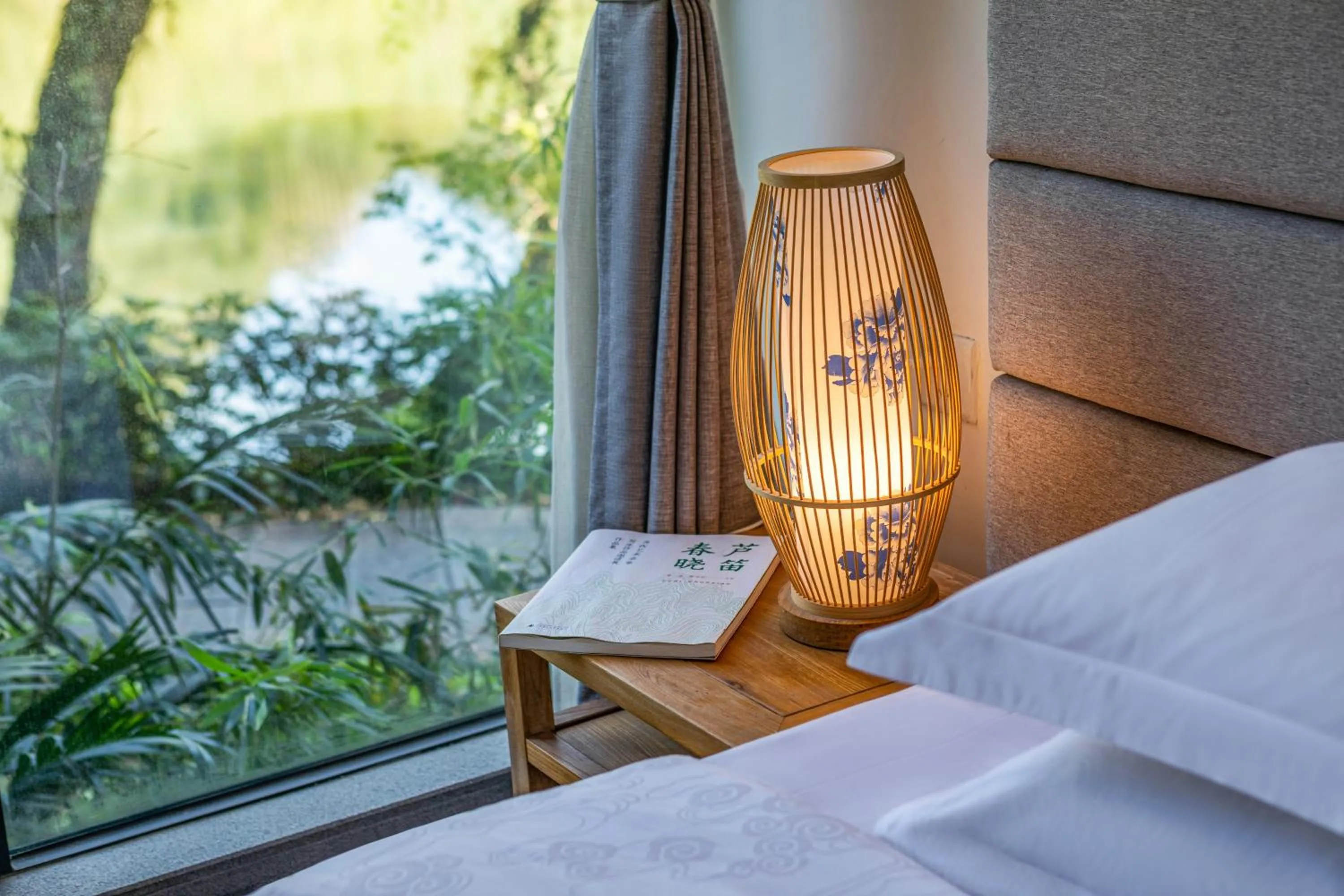 View (from property/room), Bed in Guilin HeShe Lakeside Resort