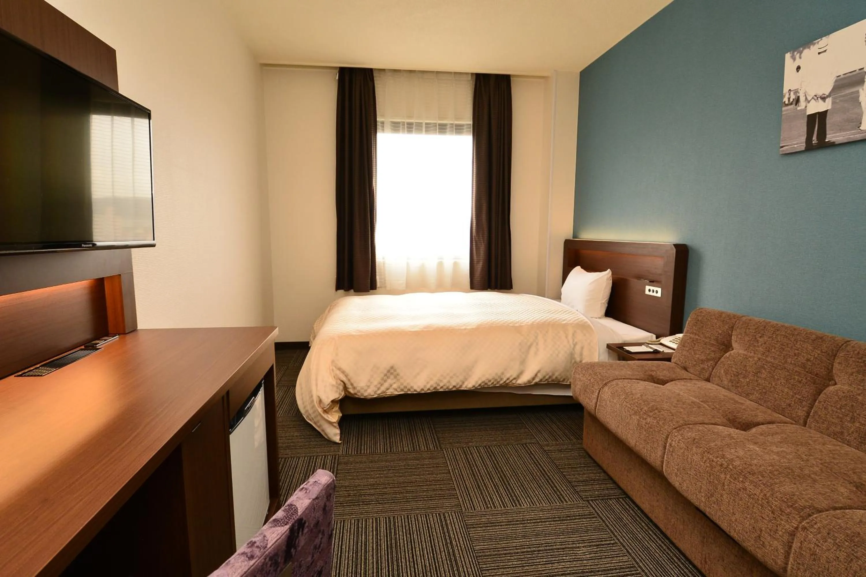 Bed in Hotel Sunroute Sano