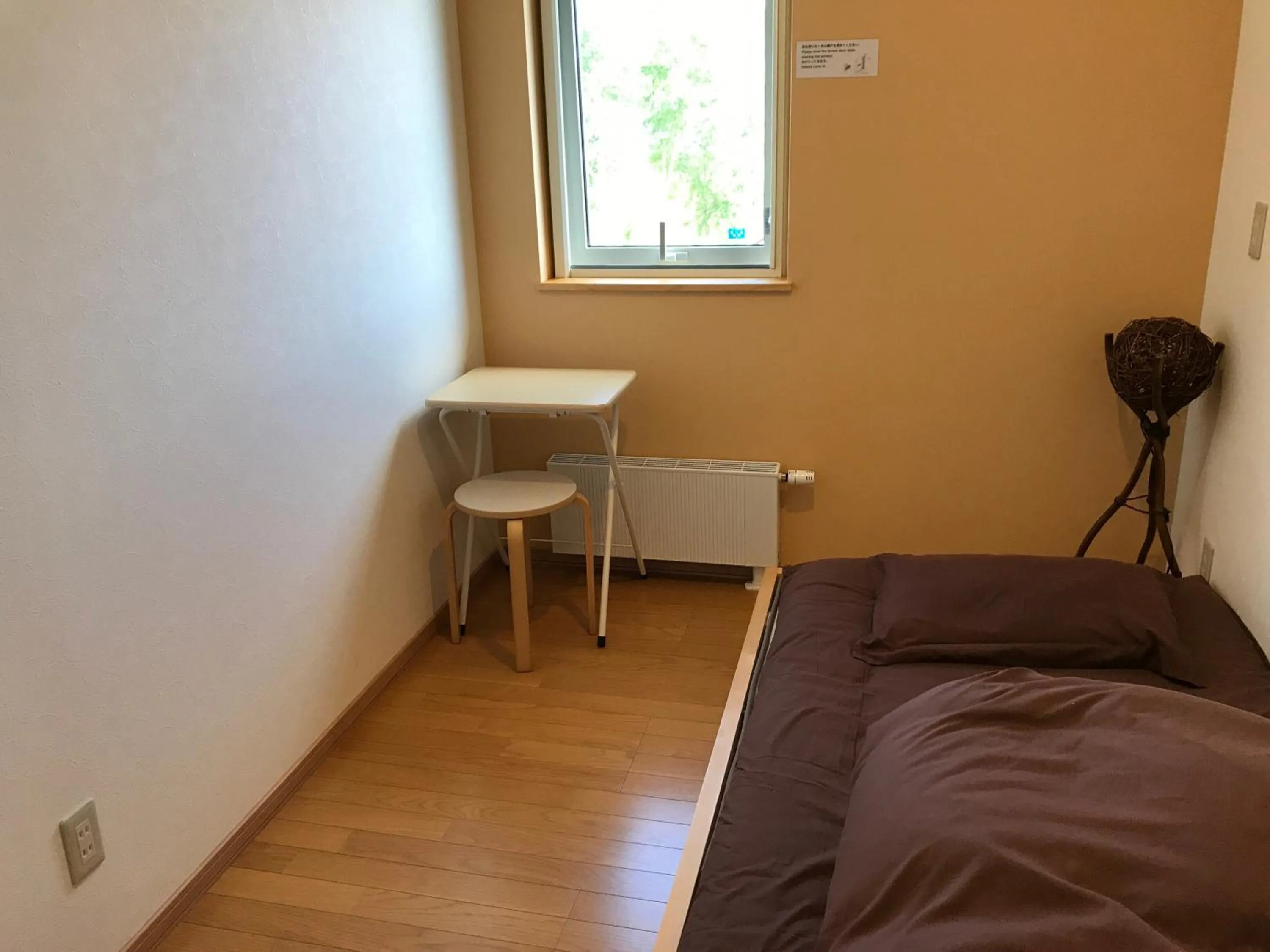 Bed in Niseko Guesthouse Nalu.