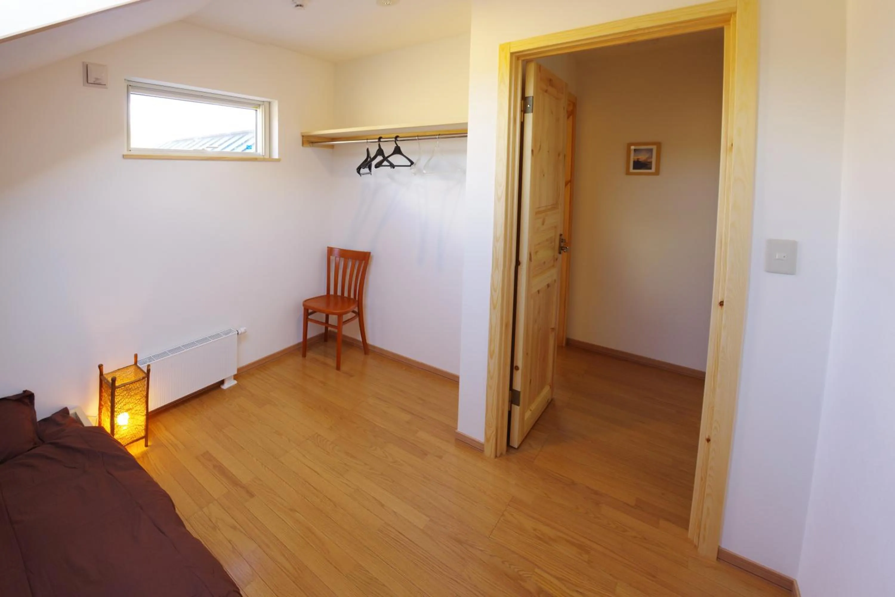 Bed in Niseko Guesthouse Nalu.