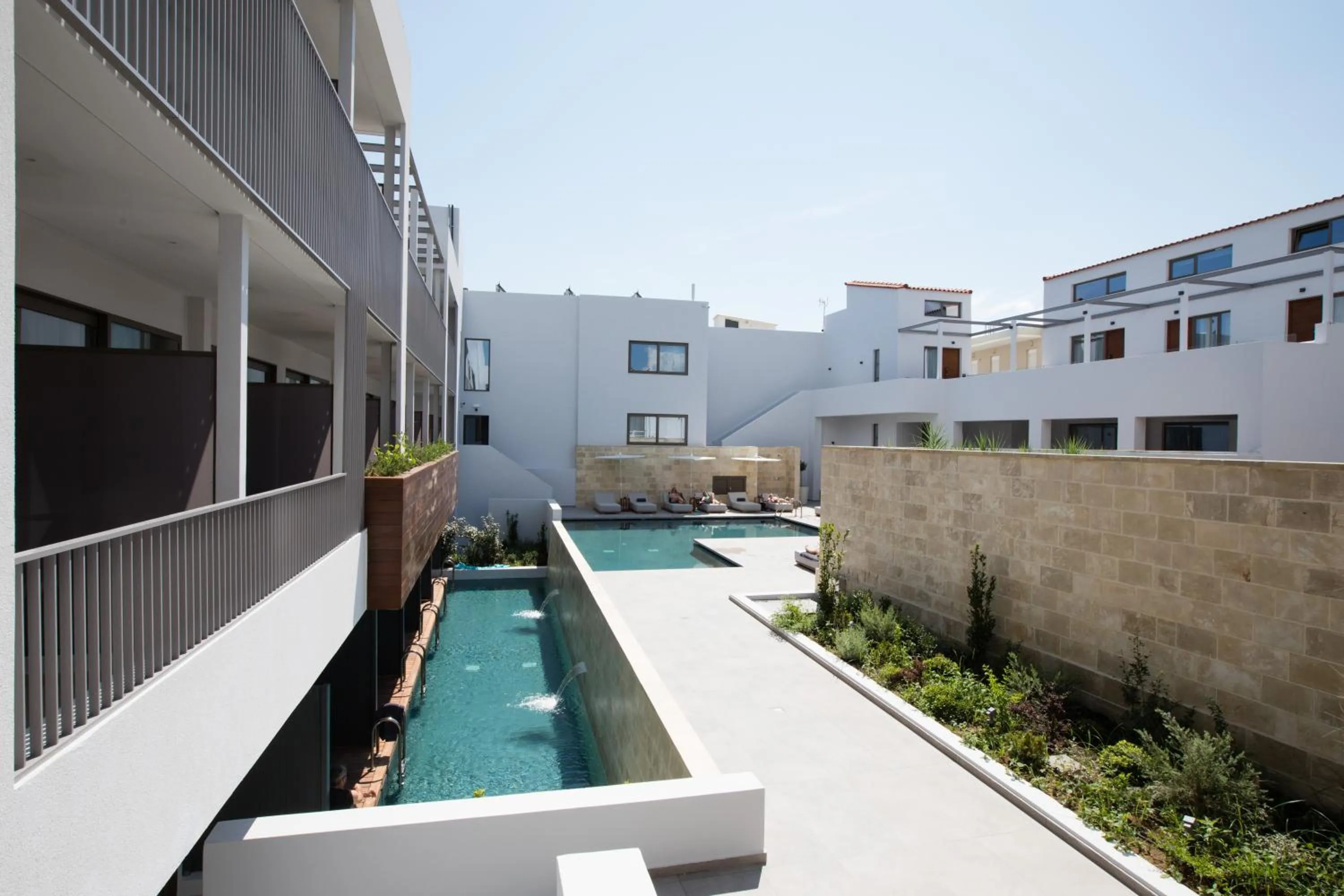 Swimming pool in Ikones Seafront Luxury Suites