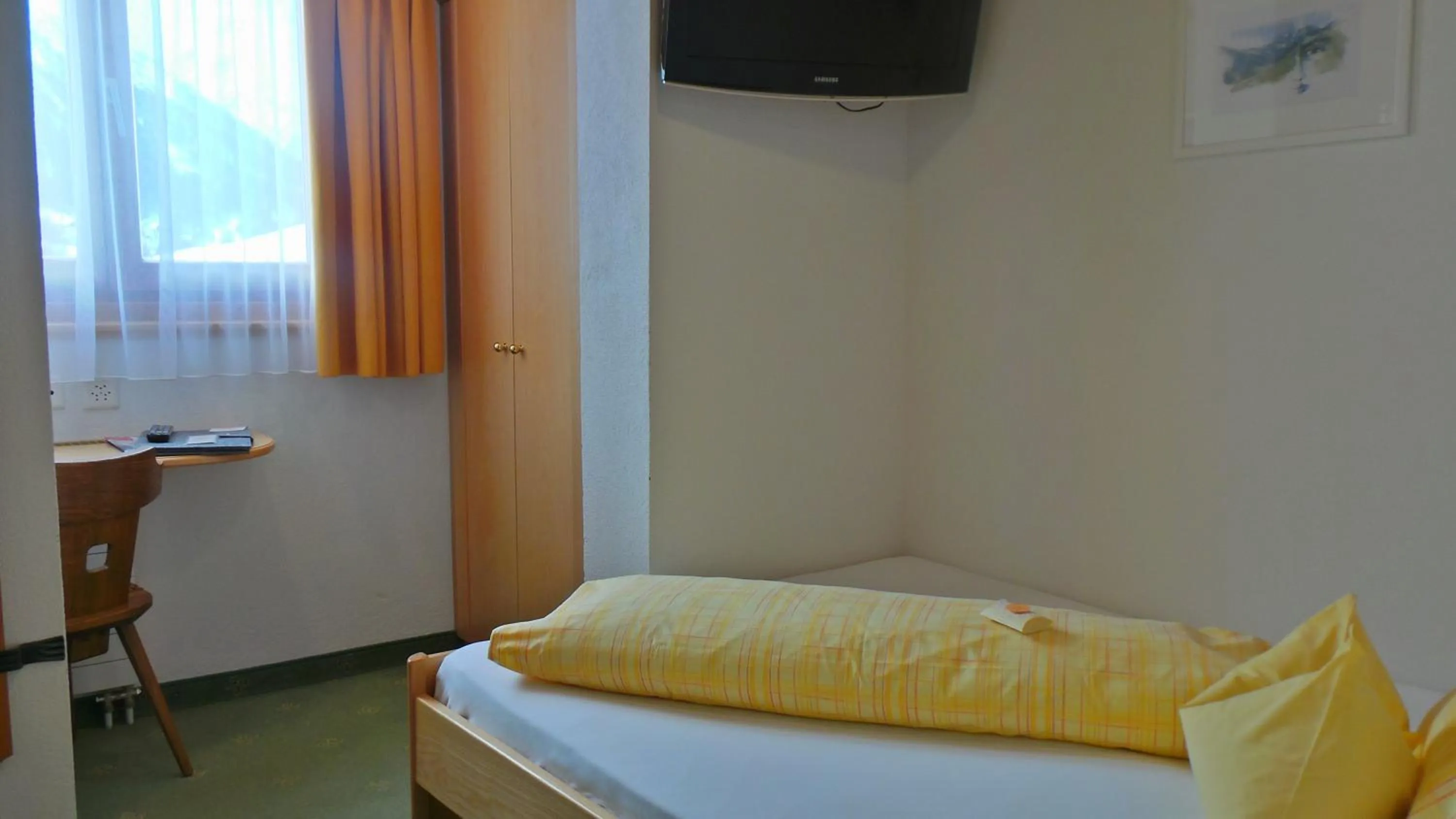 Photo of the whole room, Bed in Sonnenhotel Soldanella Sonneck