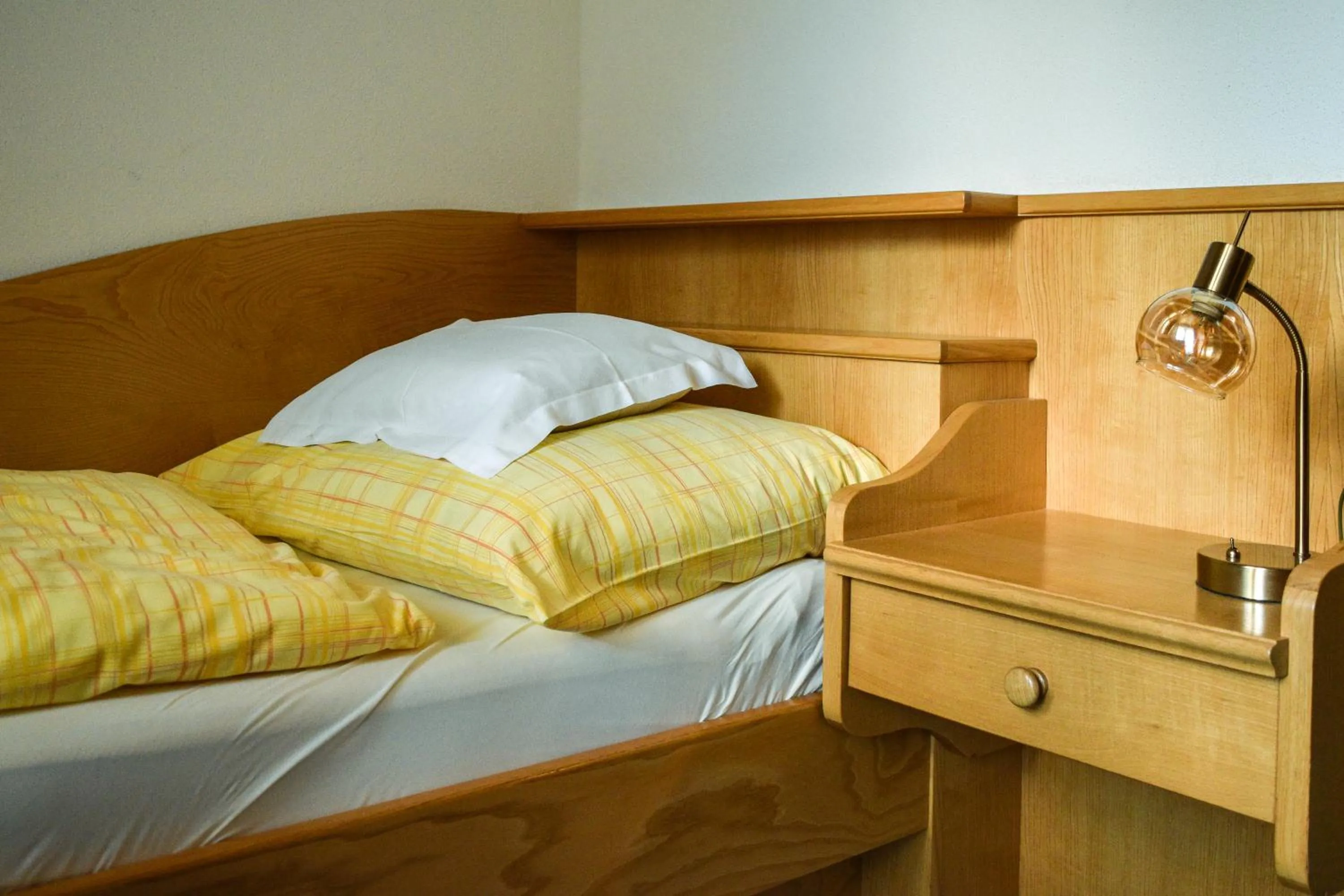 Photo of the whole room, Bed in Sonnenhotel Soldanella Sonneck