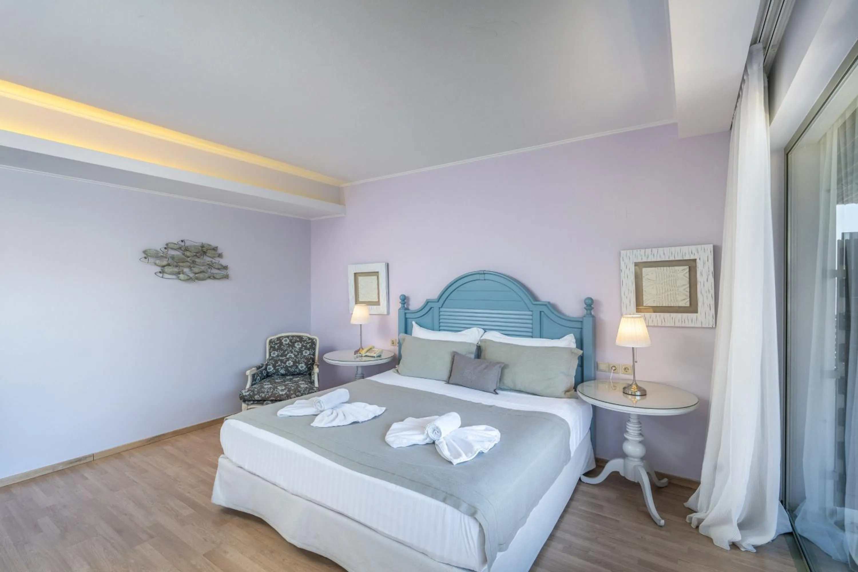 Bed in San Nicolas Resort Hotel