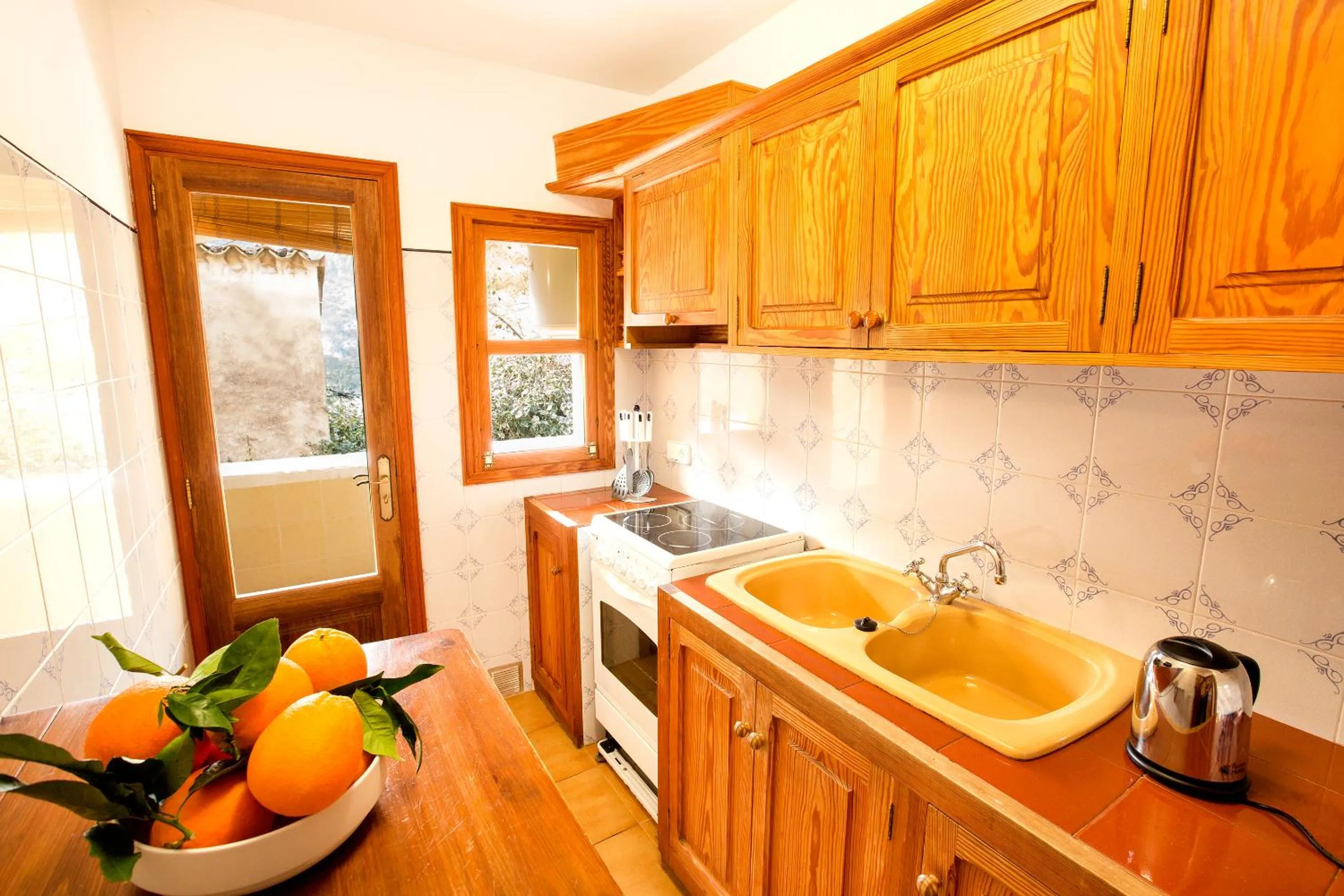 Kitchen or kitchenette in Hotel y Apartamentos DES PUIG
