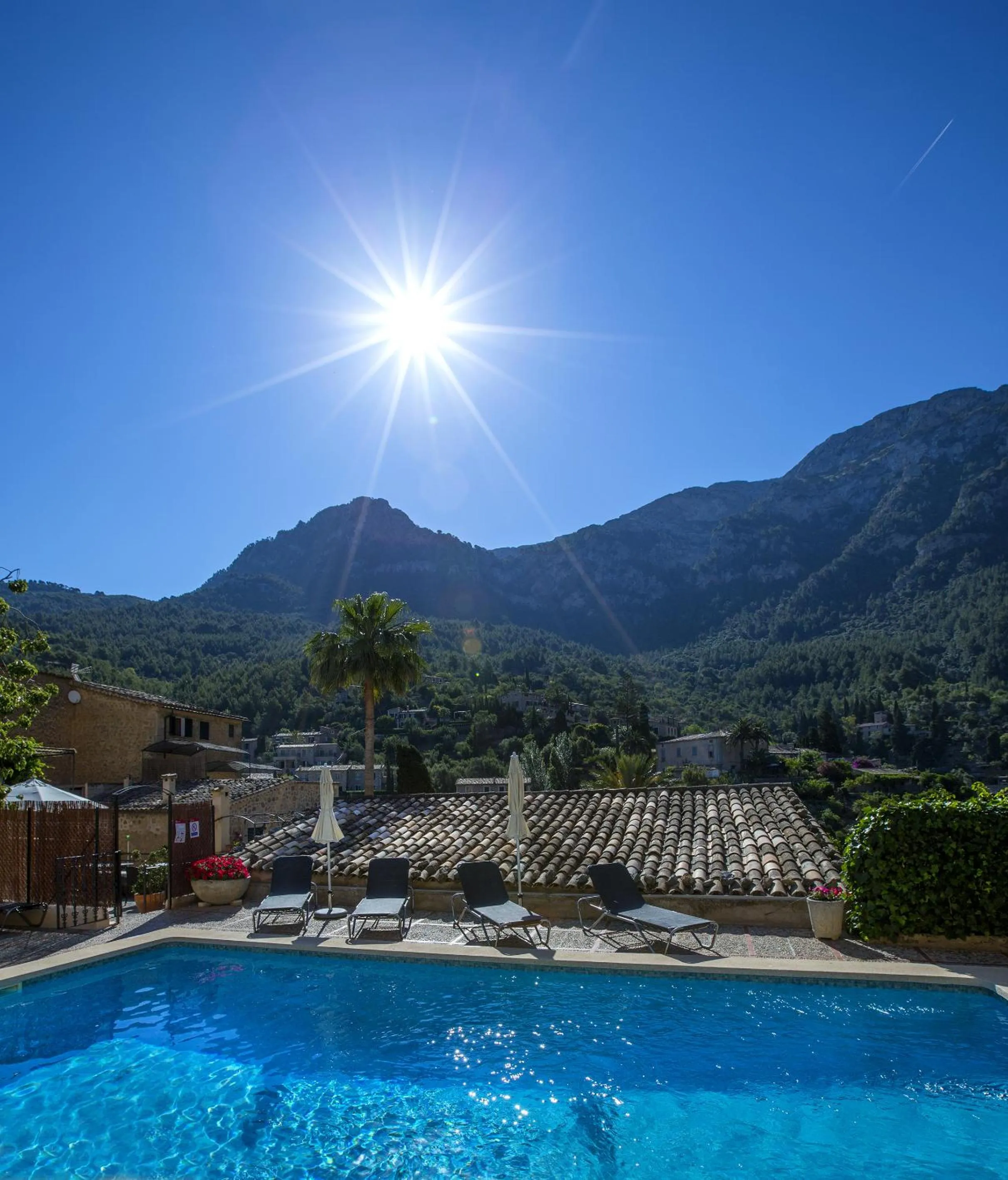 Swimming pool in Hotel y Apartamentos DES PUIG